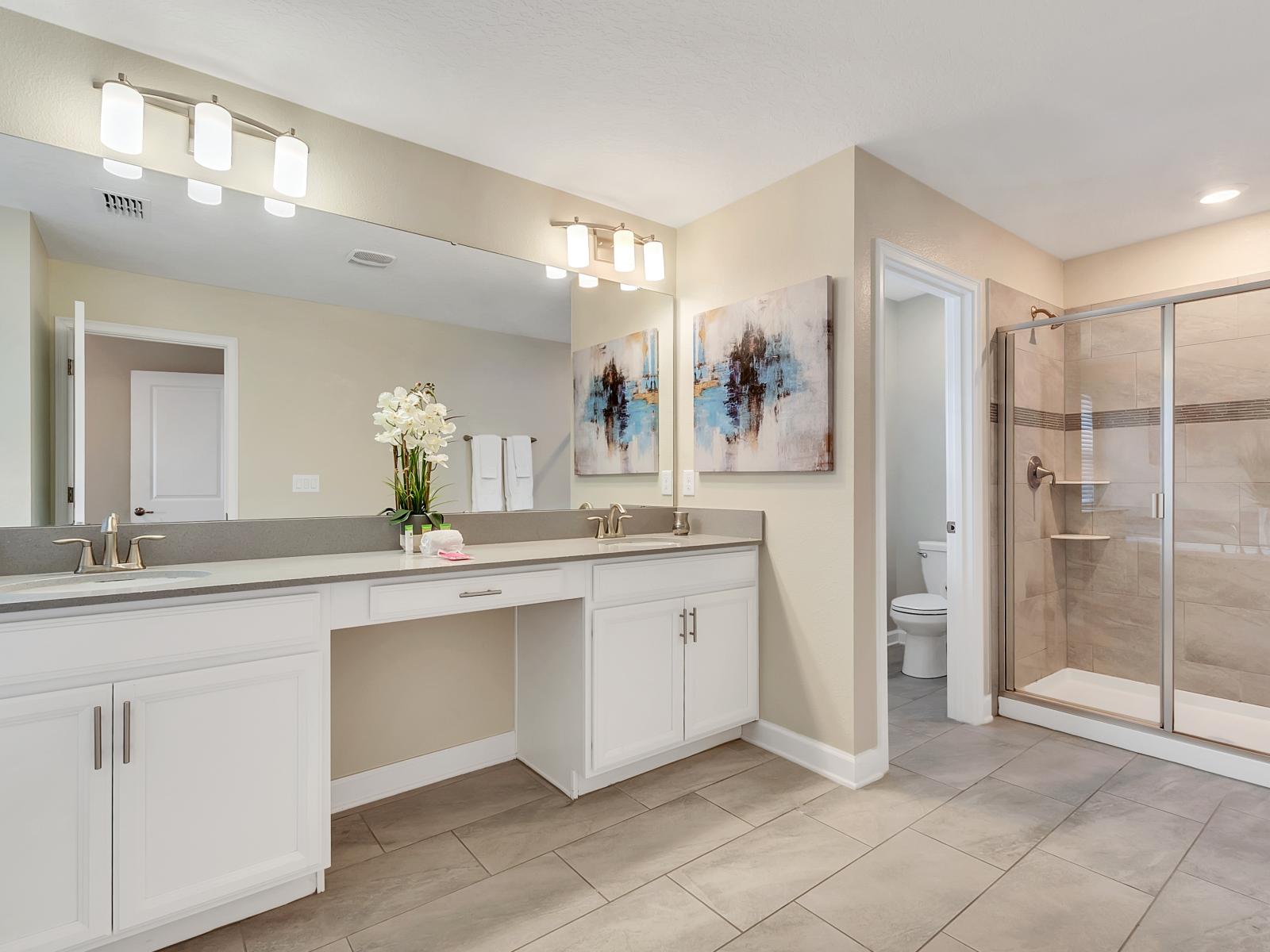 Majestic Bathroom of the Home in Davenport Florida - Retreat to bathroom with a luxurious vanity - Convenient walk-in shower provide the perfect setting for relaxation