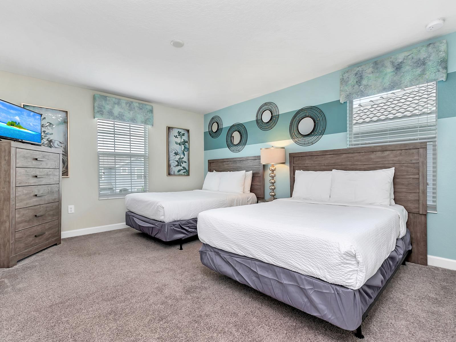 Plush Bedroom of the Home in Davenport Florida - Experience the perfect balance of space and coziness - Bedroom with two double beds  - A haven for a restful and comfortable stay