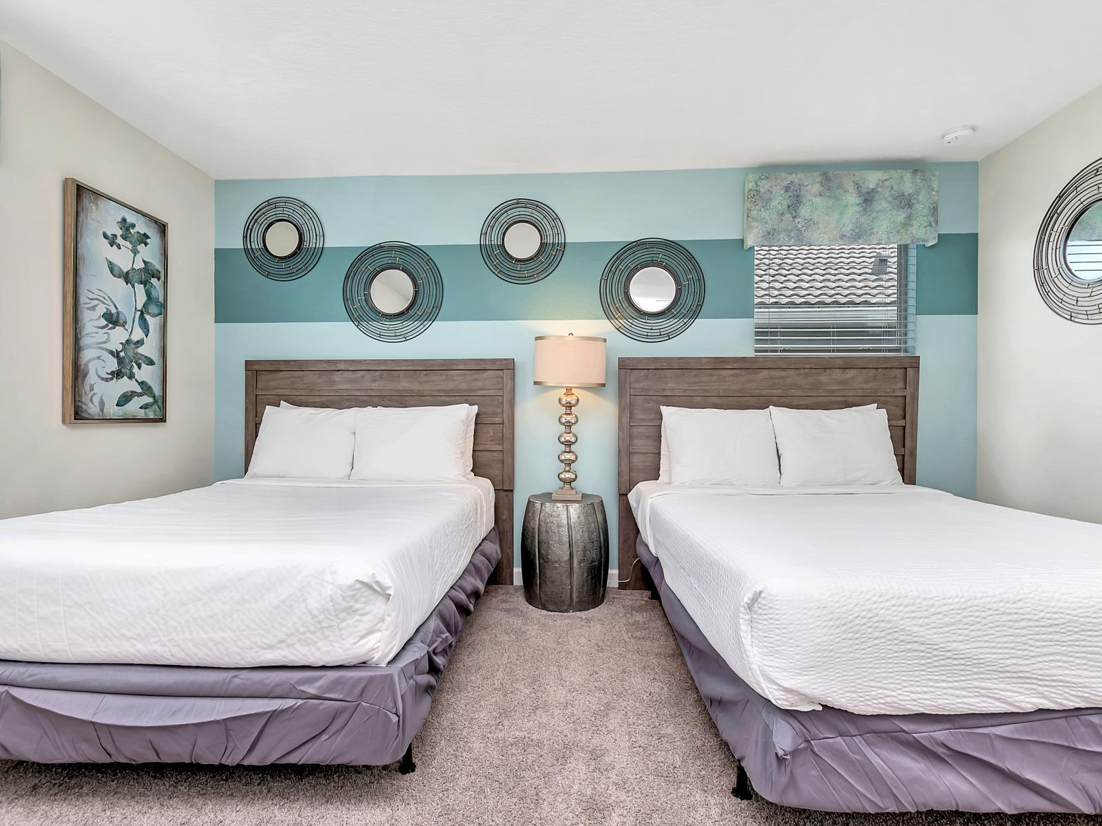 Amazing Bedroom of the Home in Davenport Florida - Plush furnishings for ultimate relaxation - Two cozy double bed for restful nights - Indulge in the ultimate getaway