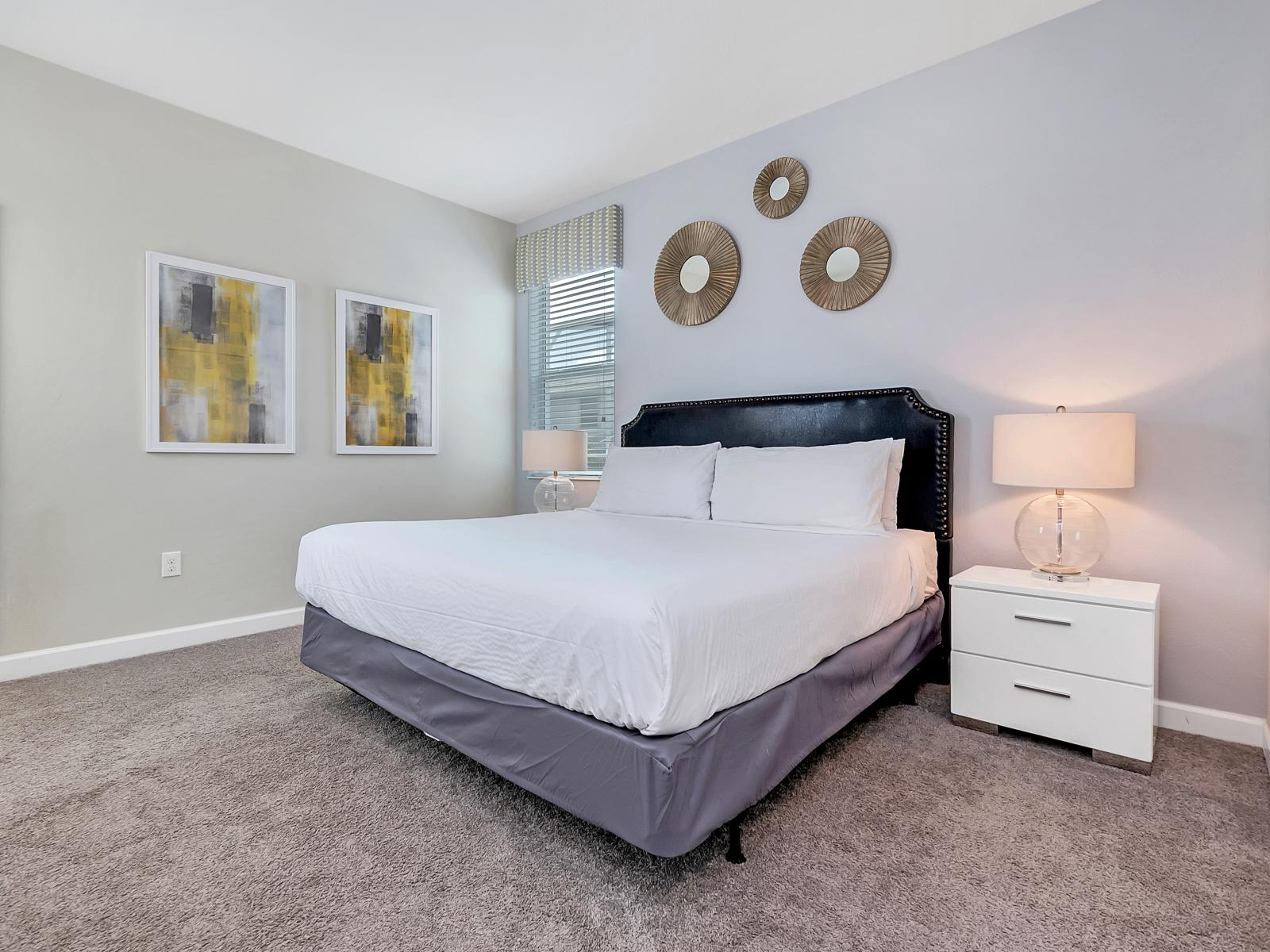 Serene Bedroom of the Home in Davenport Florida - Cozy Bed - Spacious bedroom offering comfort and style - Cozy retreat with a plush bed, perfect for relaxation