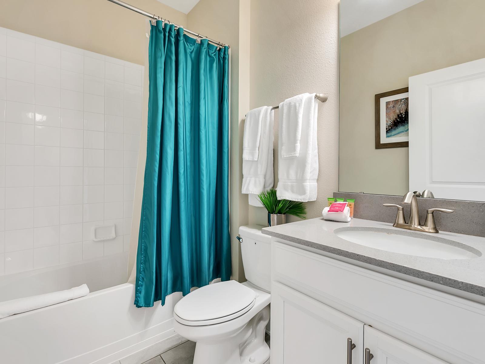 Exclusive Bathroom of the Home in Davenport Florida - Neat and clean toilet seat - Availability of all bathroom amenities - Beautiful large vanity with large size mirror  - Elegant lighting