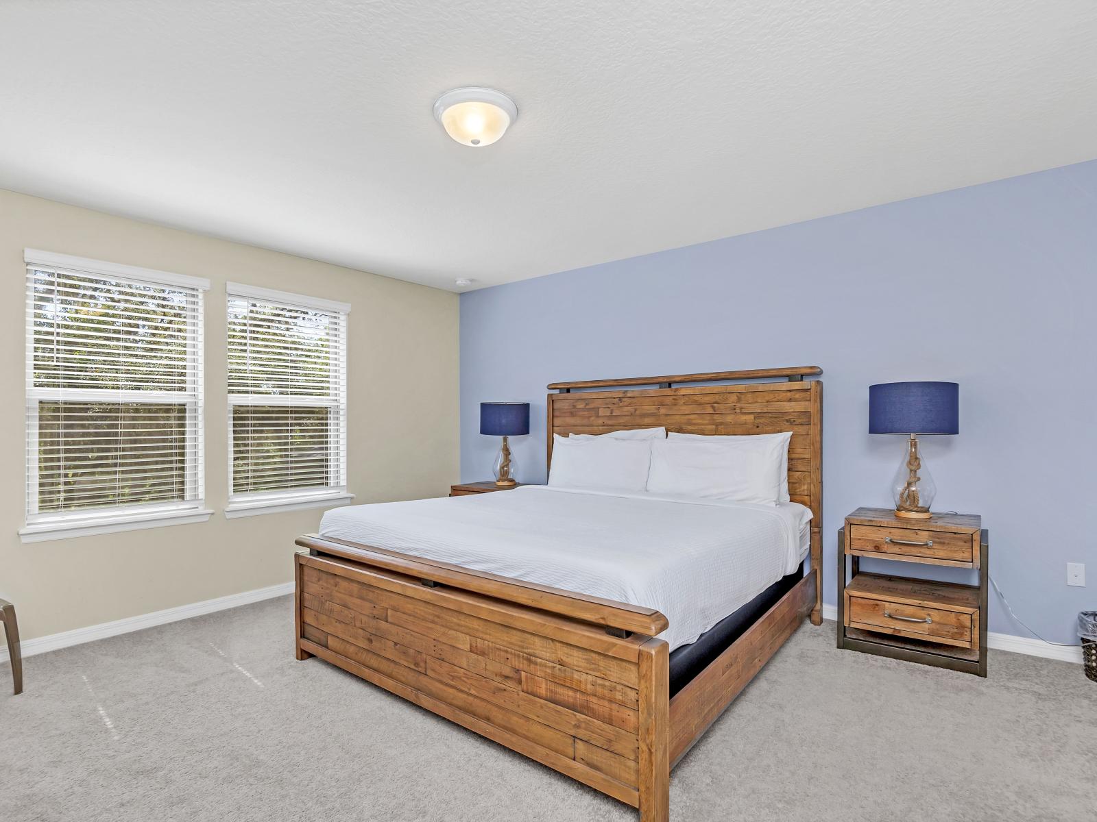 Rustic Retreat: This bedroom, adorned with a wooden bed frame and furnishings, exudes a natural charm and timeless appeal. A cozy haven where the warmth of wood blends seamlessly with comfort for a restful escape.