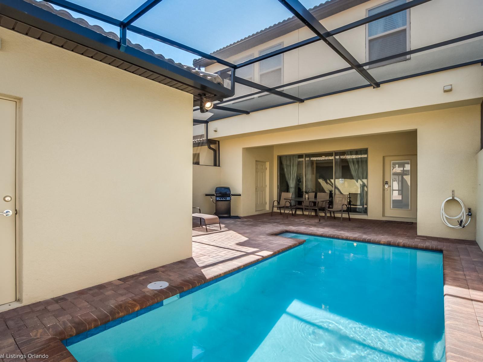 Splendid private Pool of the Apartment in Kissimmee - Cosy beach chairs available - Dive into refreshing poolside escape - Immerse yourself in the cool elegance of our pool - Experience ultimate relaxation in our poolside paradise