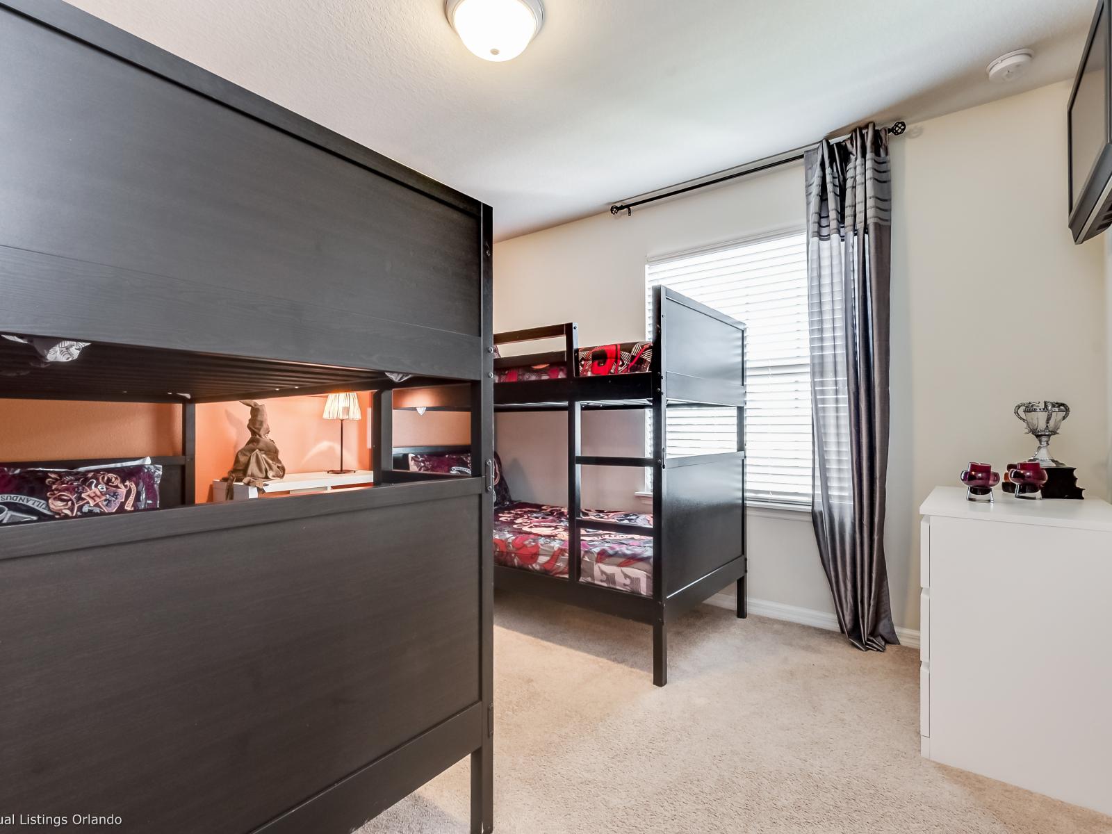 Experience the magic of Disney with our Harry Potter-themed room, with two cozy Bunker beds. - Stunning wardrobe with sufficient space - Enjoy the Availability of Smart Tv and Netflix - Indulge in mesmerizing views from the windows of the room