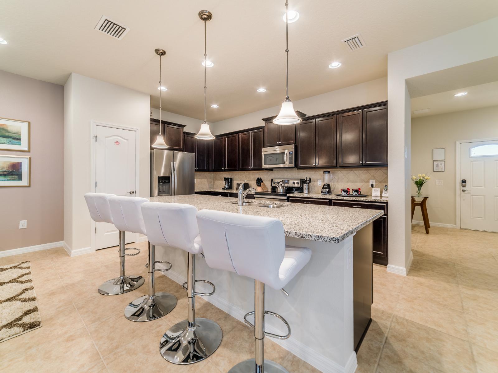 Modern Kitchen of the Townhouse in Kissimmee Florida - Fully equipped kitchen where casual elegance meets the creation of delicious meals - Plenty storage space for organized and clutter-free counters