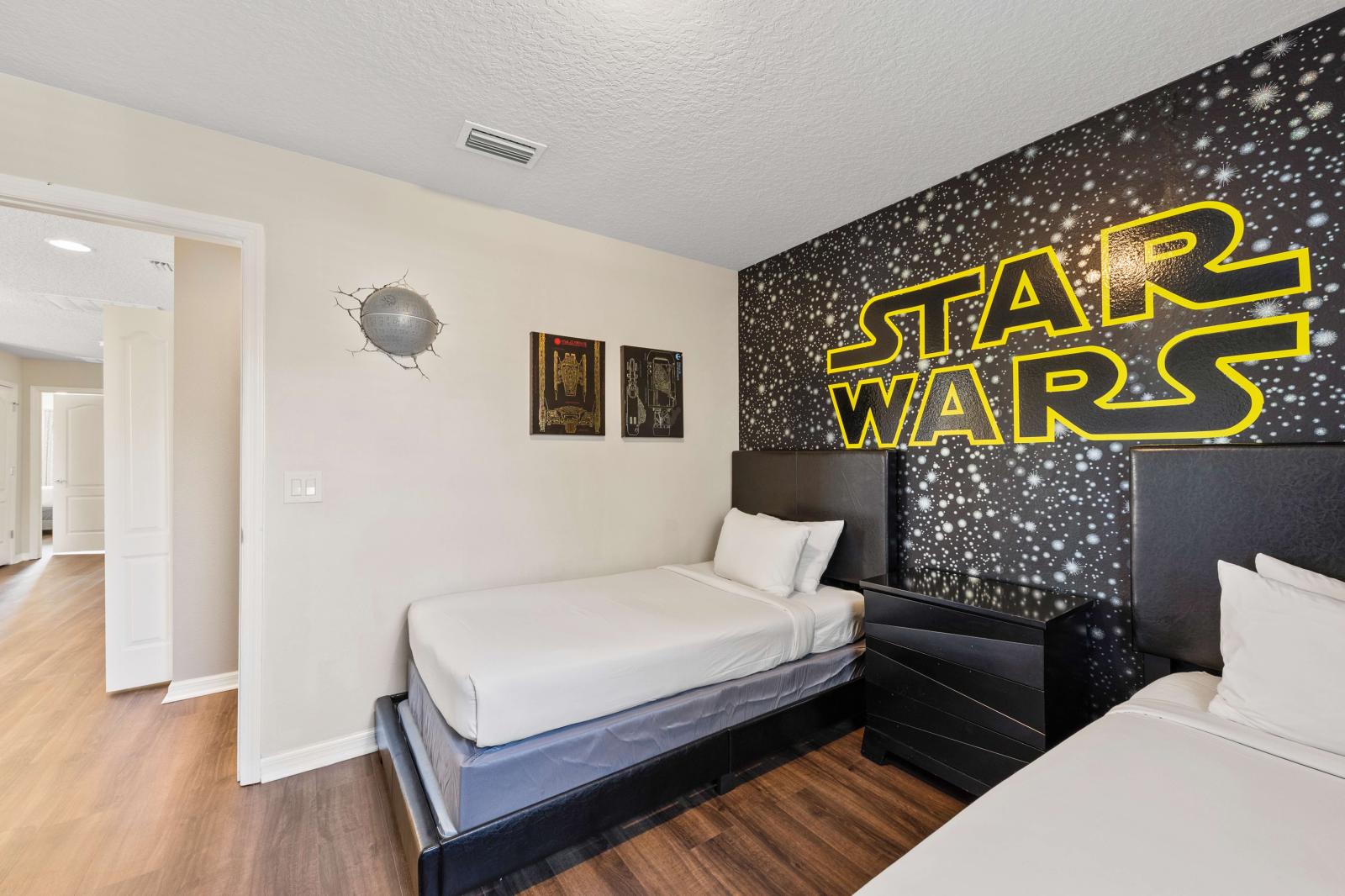 Bedroom 4 with 2 single beds and decorated with Star Wars theme