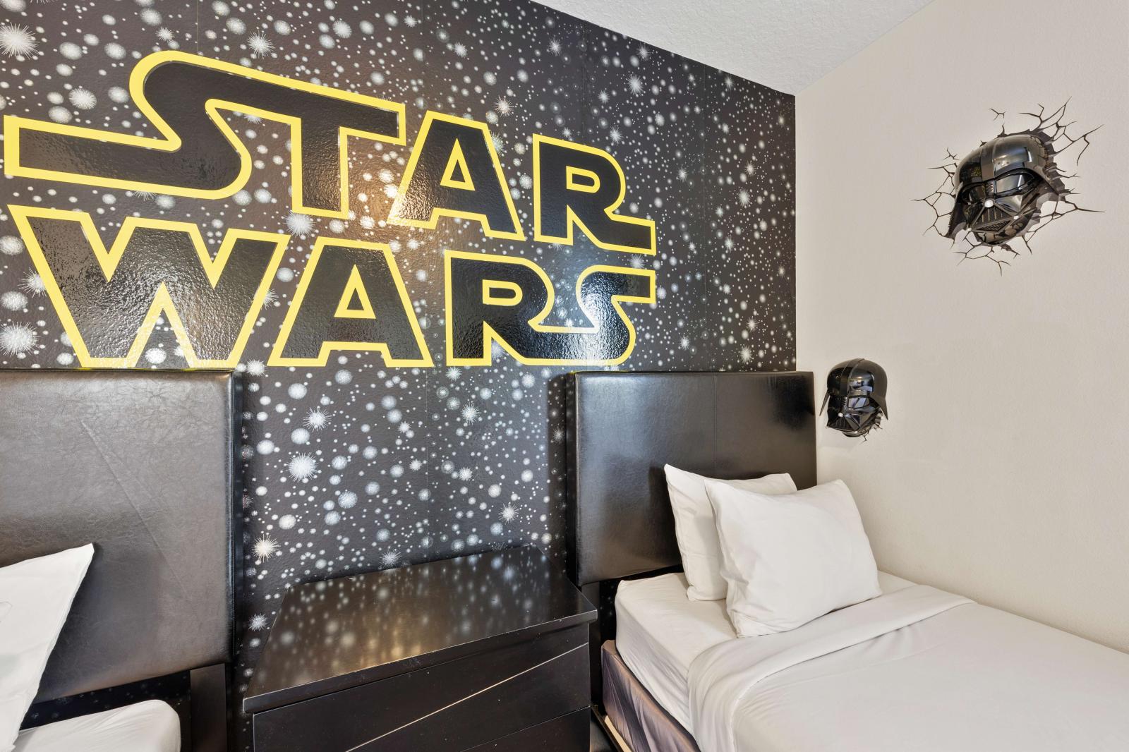 Bedroom 4 with 2 single beds and decorated with Star Wars theme