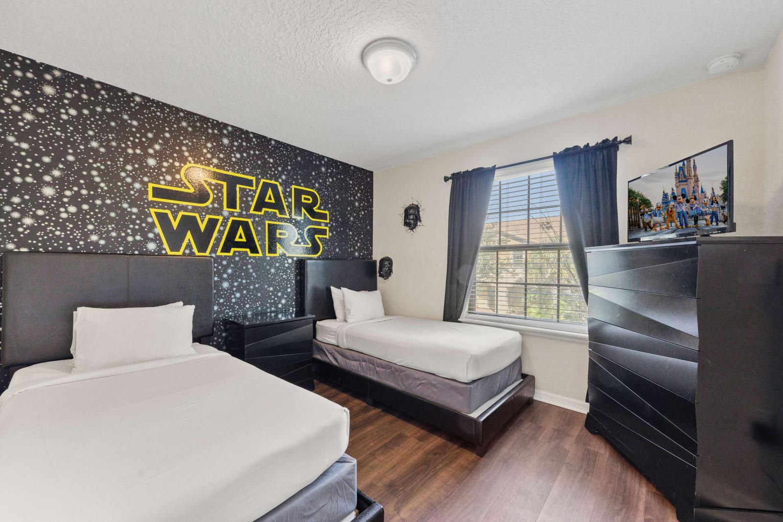 Bedroom 4 with 2 single beds and decorated with Star Wars theme