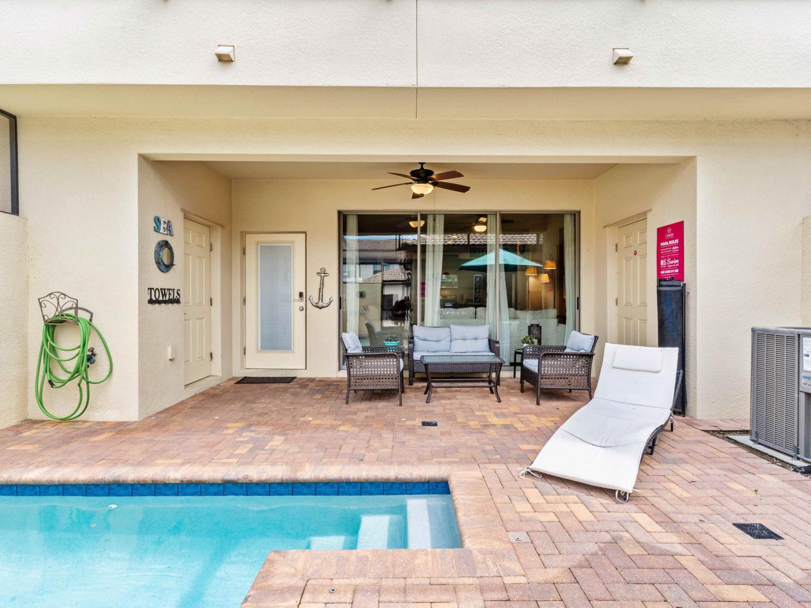 Poolside Paradise: The pool deck, adorned with comfortable seating and a dining area, invites you to indulge in leisurely moments of relaxation and al fresco dining, creating cherished memories under the sun-drenched sky.