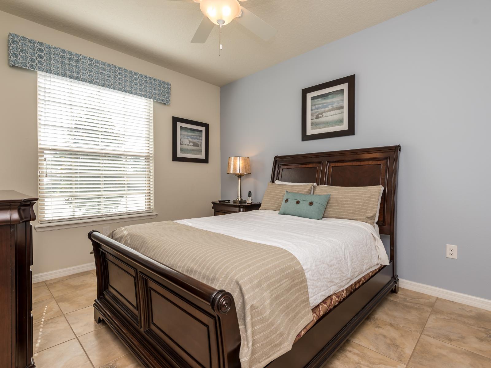 This wooden bed transforms the bedroom into a rustic sanctuary, where the timeless allure of wood merges with comfort, creating a cozy haven for rest and rejuvenation.