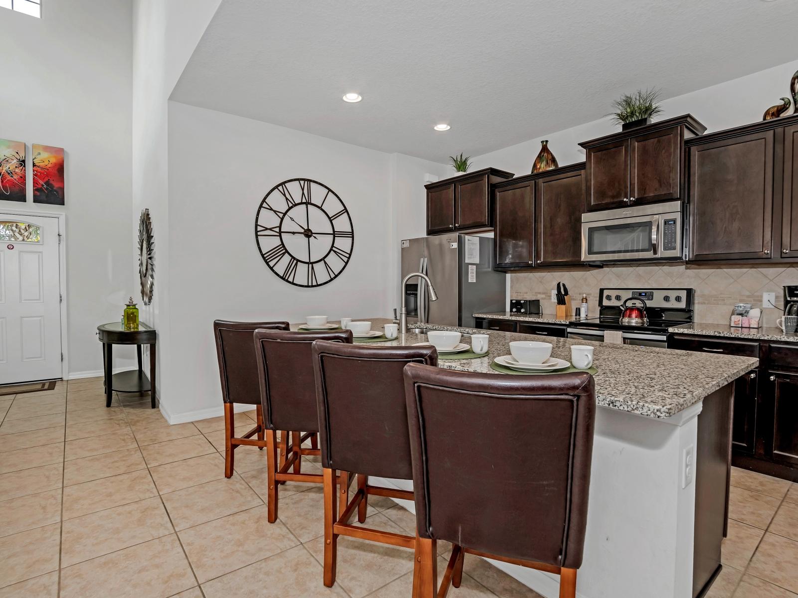 Gather around our stunning 6-person dining table amidst elegant decor.