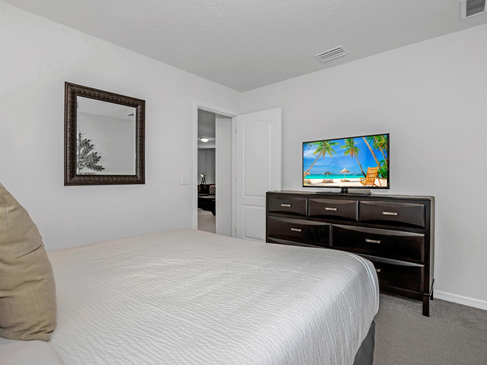 Dream in comfort: Experience ultimate relaxation in our cozy, inviting bedroom.