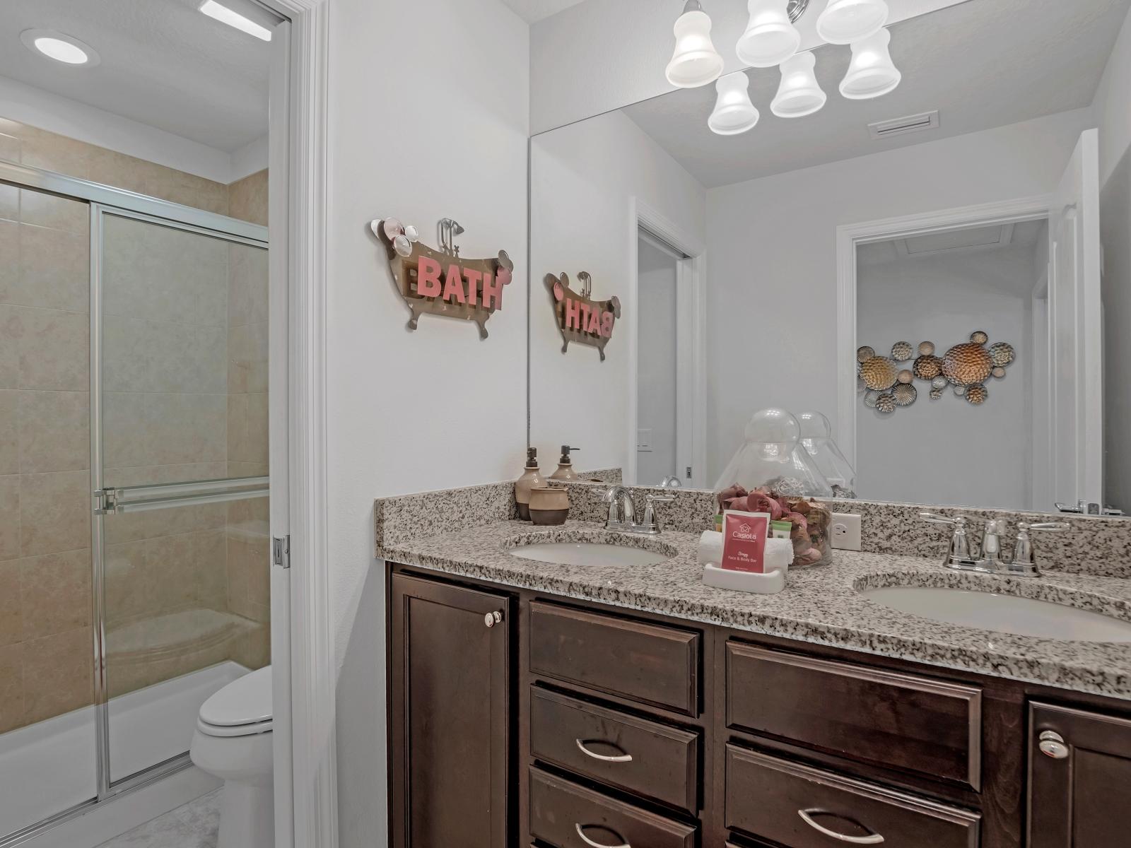 Indulge in luxury: Our classy bathroom offers a serene retreat with upscale amenities.