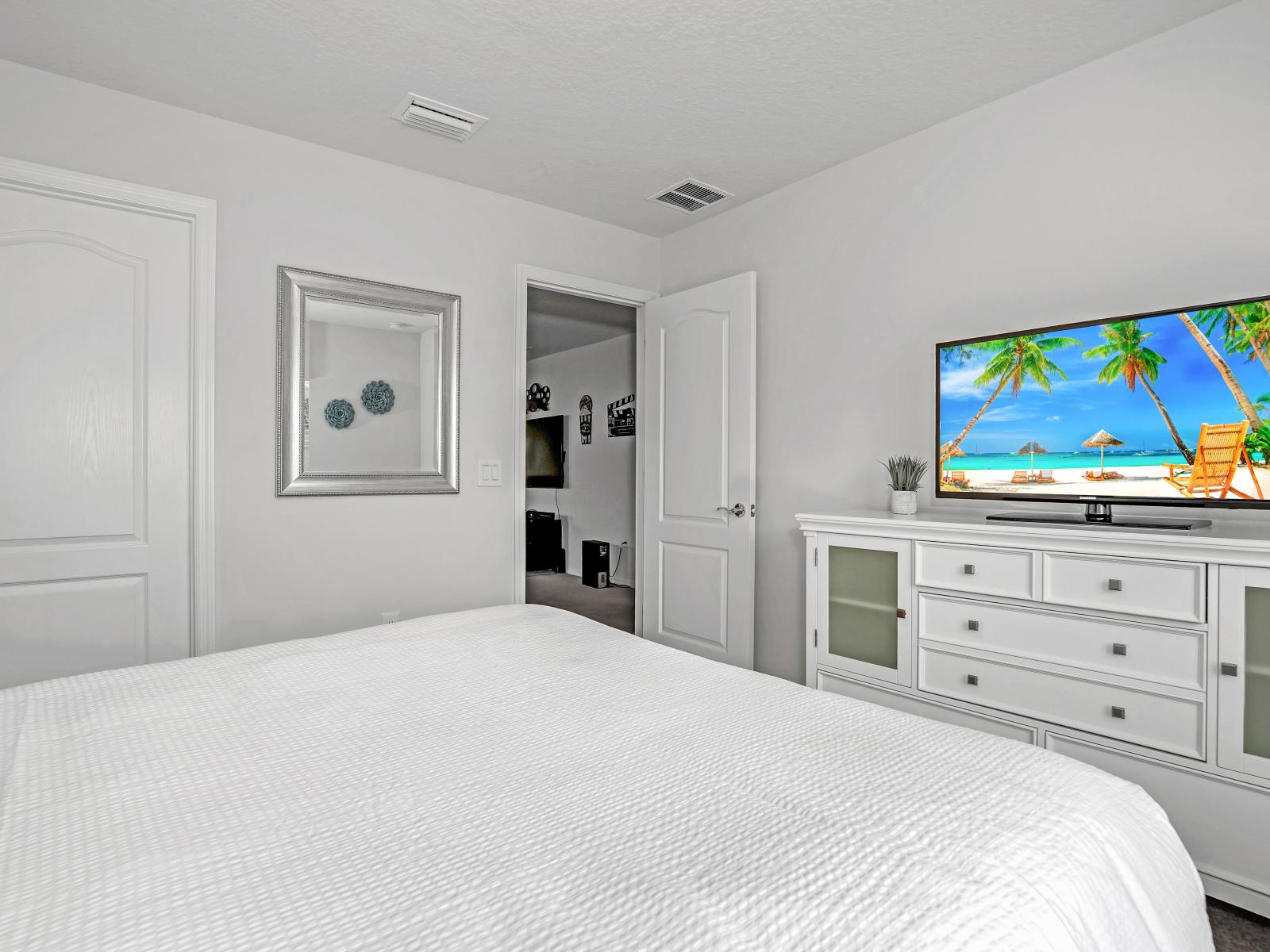 Unwind in style: Our comfy bedroom offers a perfect blend of comfort and charm.