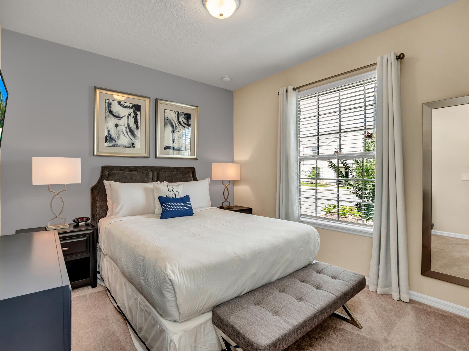 Ground floor bedroom with queen bed