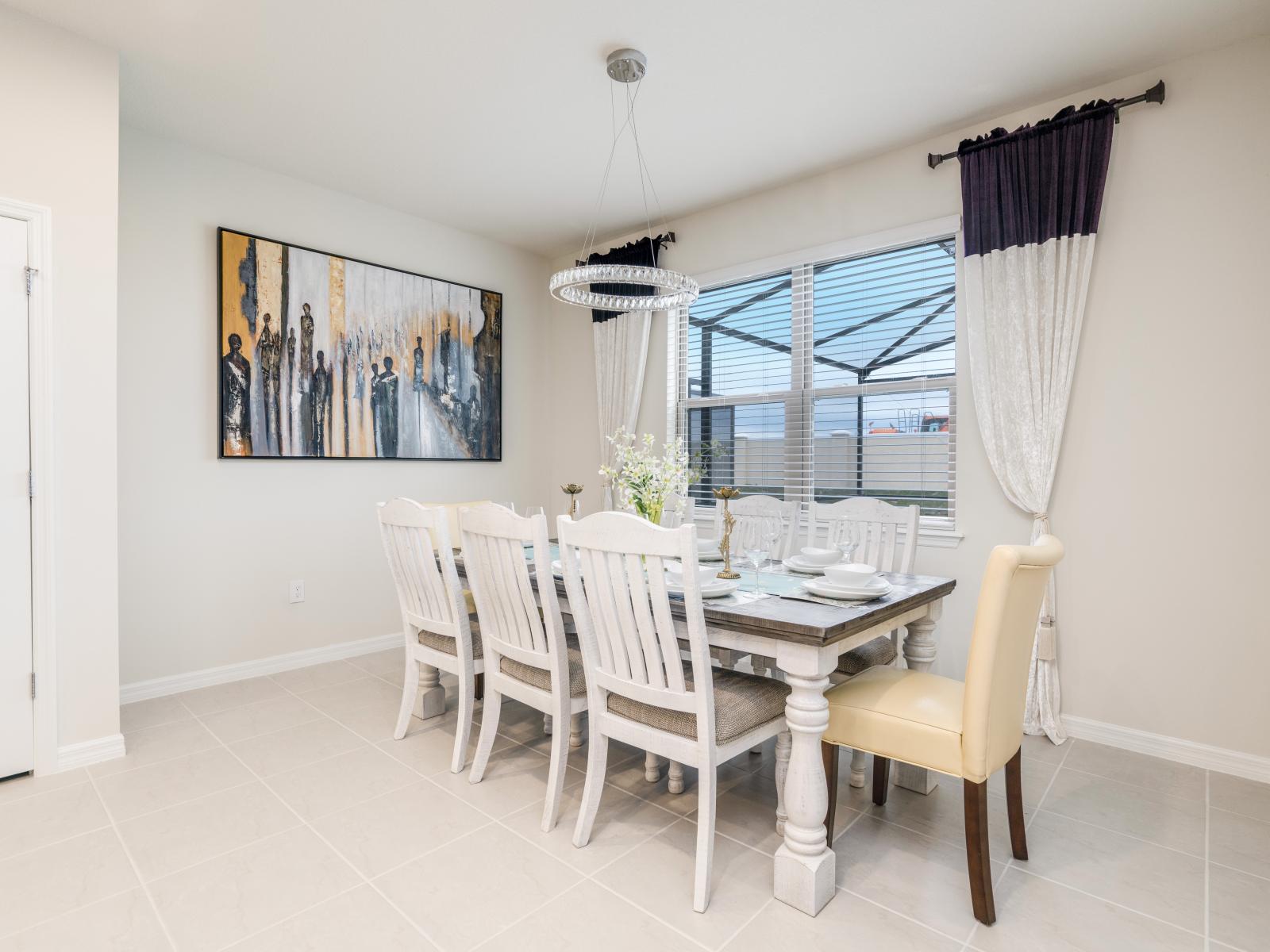 Elite dinning area of the apartment in Kissimmee - Beautiful window facing dinning area of the apartment - Elite 3 persons dinning - Stunningly located large windows with mesmerizing views - Majestic decored space with beautiful paintings