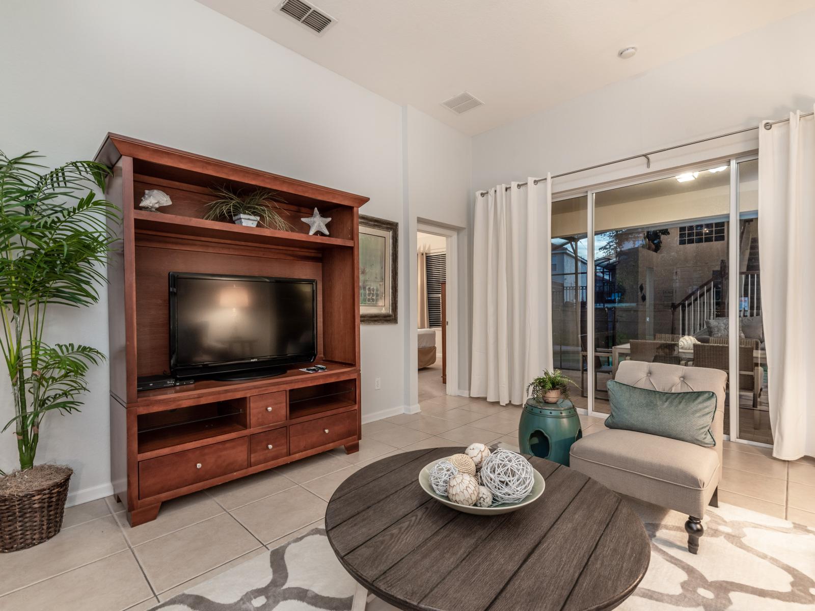 The Living area-Whether unwinding with your favorite show or hosting gatherings, this inviting space combines modern comfort with seamless entertainment, ensuring unforgettable moments with loved ones.