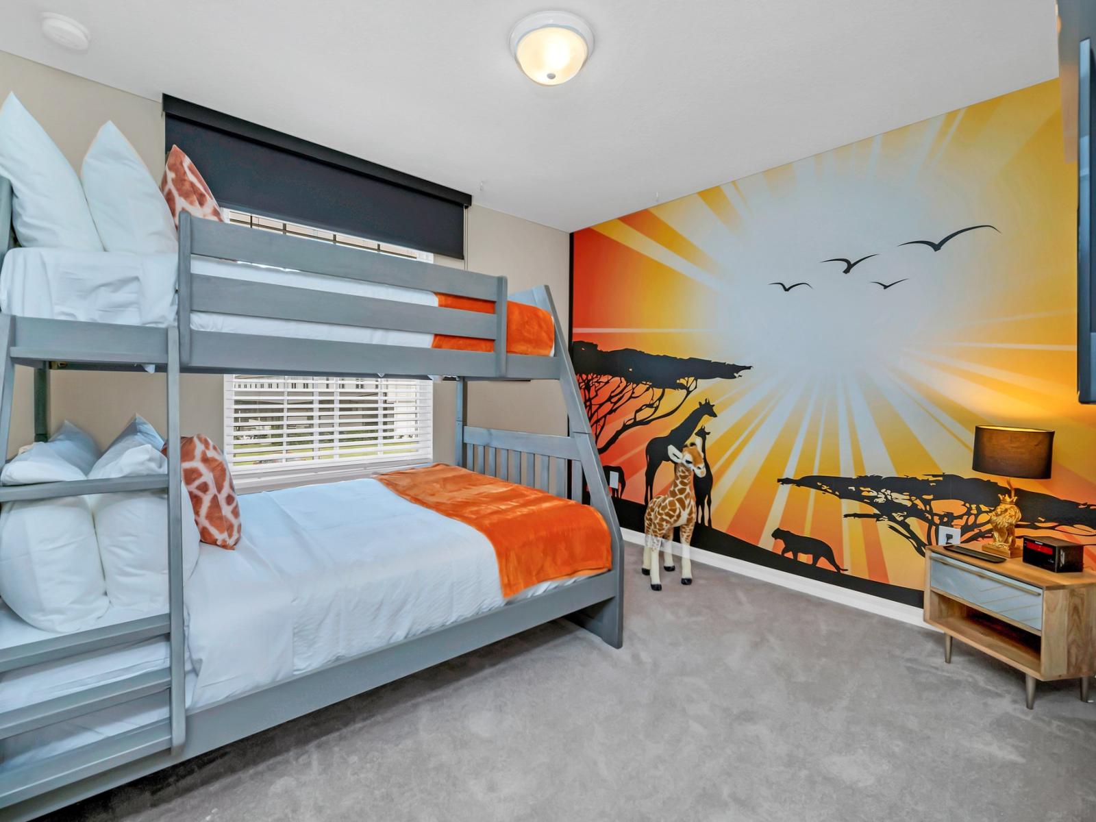 Lion king themed bedroom of the townhouse in Polk County, Florida - Bunk bed arrangement fit for young explorers to embark on thrilling adventures in the kingdom of imagination - Smart TV for kids entertainment