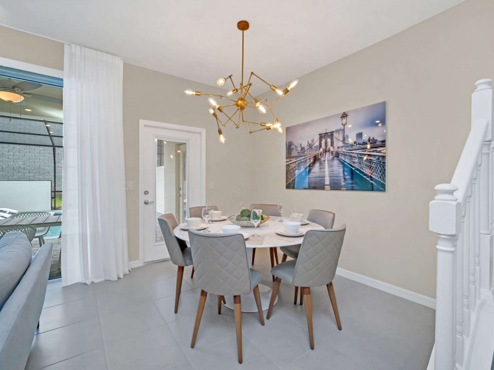 A unique fixture right above this six seater dining table will give you a good lighting for a nice dining experience.