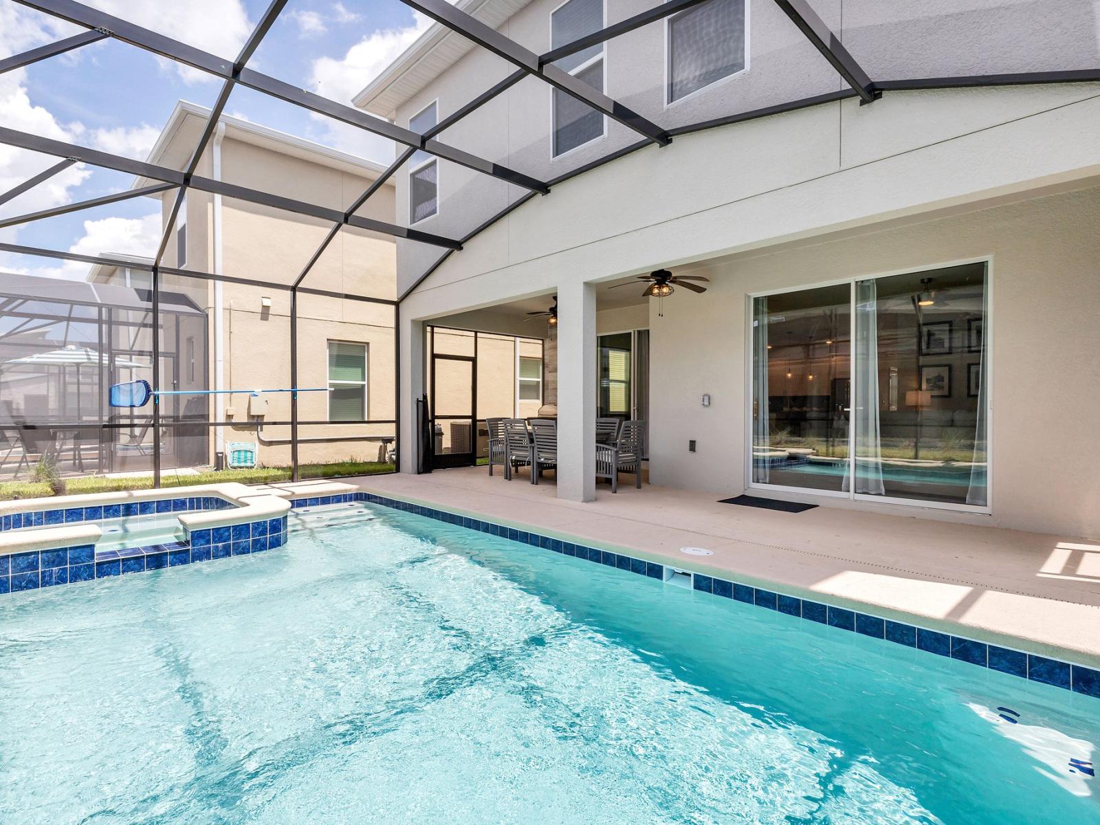 Stunning private pool of the home in Kissimmee Florida - Dive into a refreshing poolside escape - Enjoy leisurely moments in our inviting pool area - Lounge in tranquility by the sparkling waters