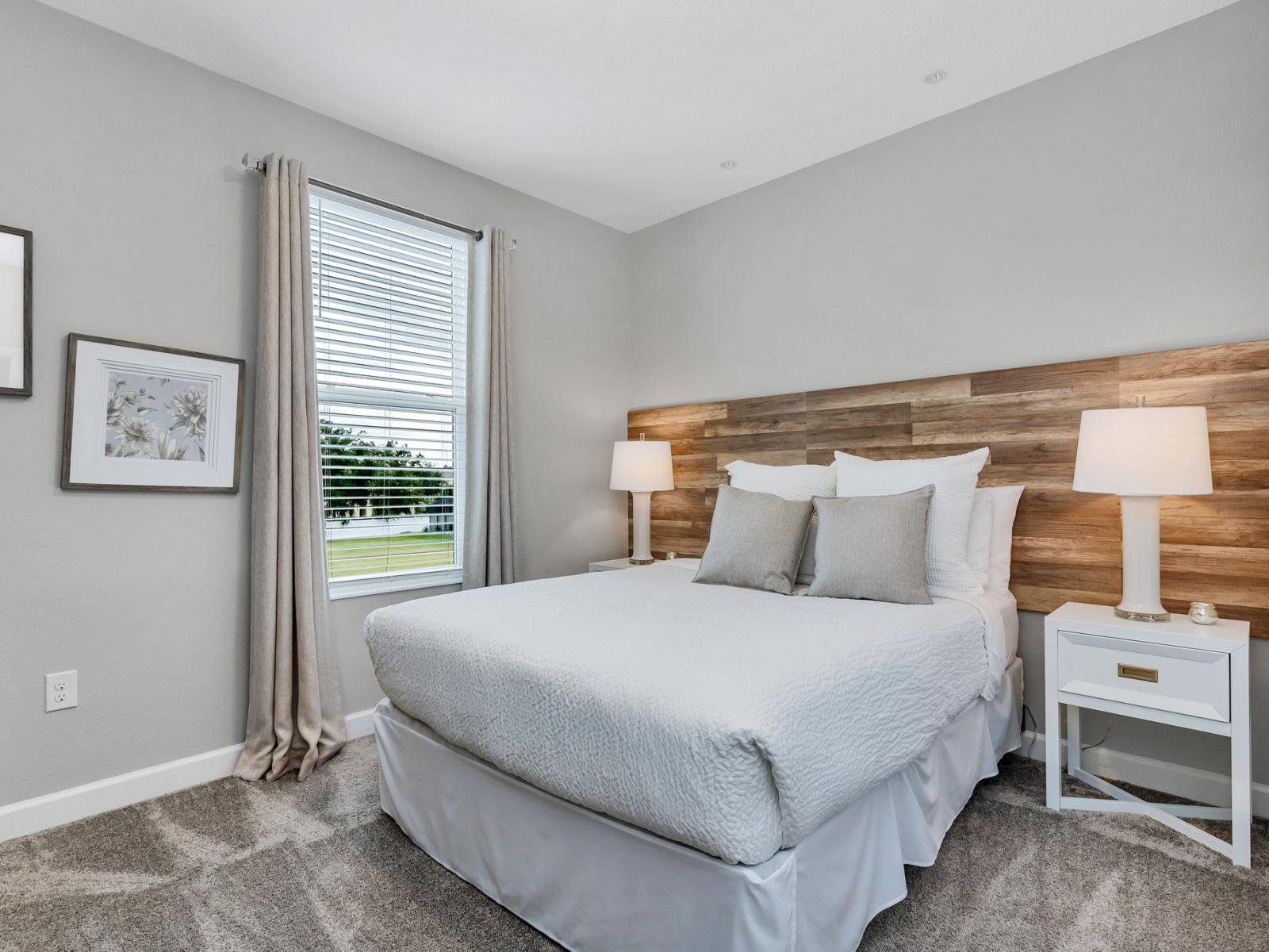 Calming bedroom of the home in Kissimmee Florida - Thoughtfully designed bedroom featuring functional and stylish furniture - Comfy double bed - Tranquil bedroom retreat for restful nights