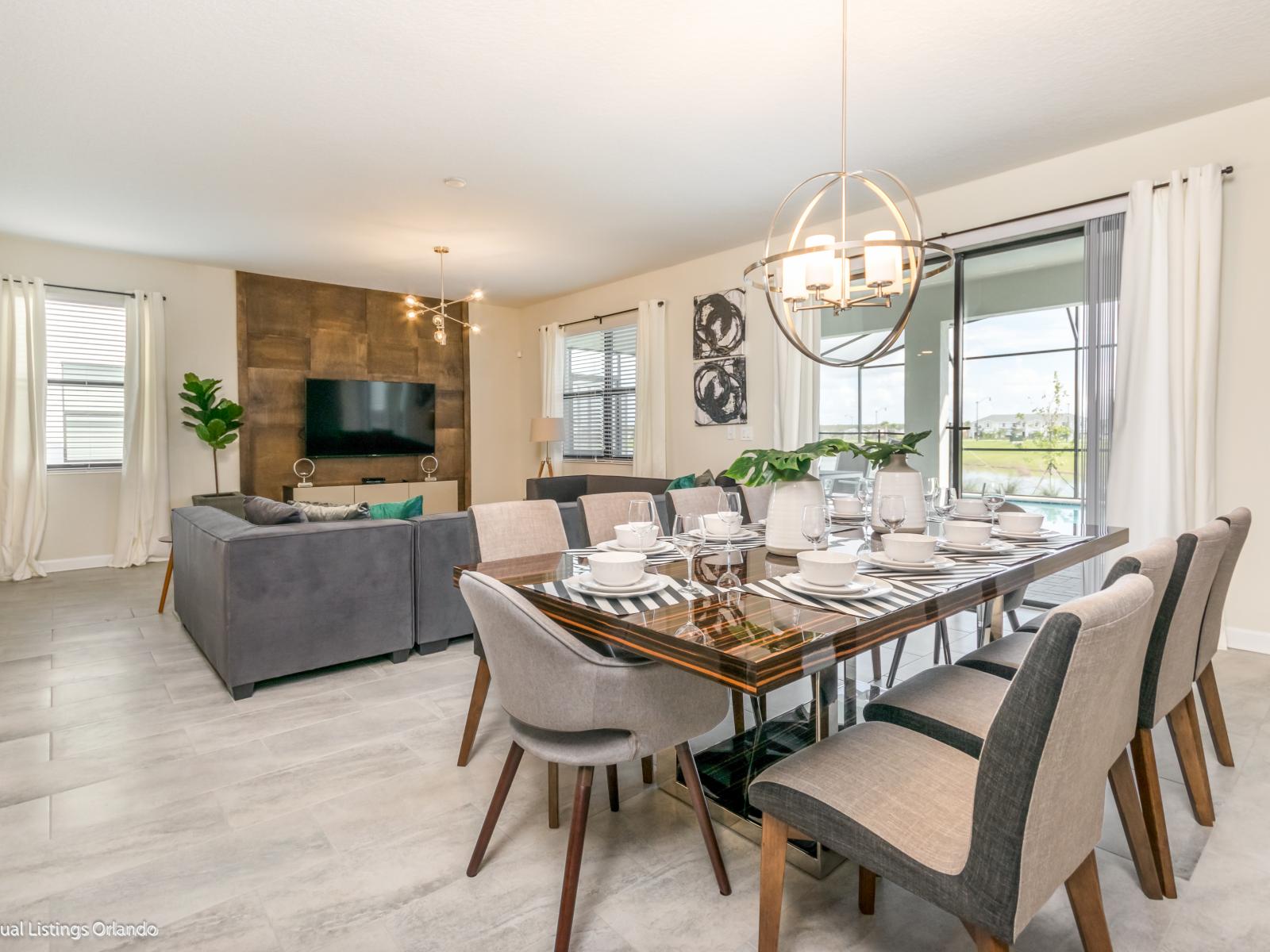 This open layout of the dining and living room is professionally designed and decorated to give our guests airy feel throughout the home.