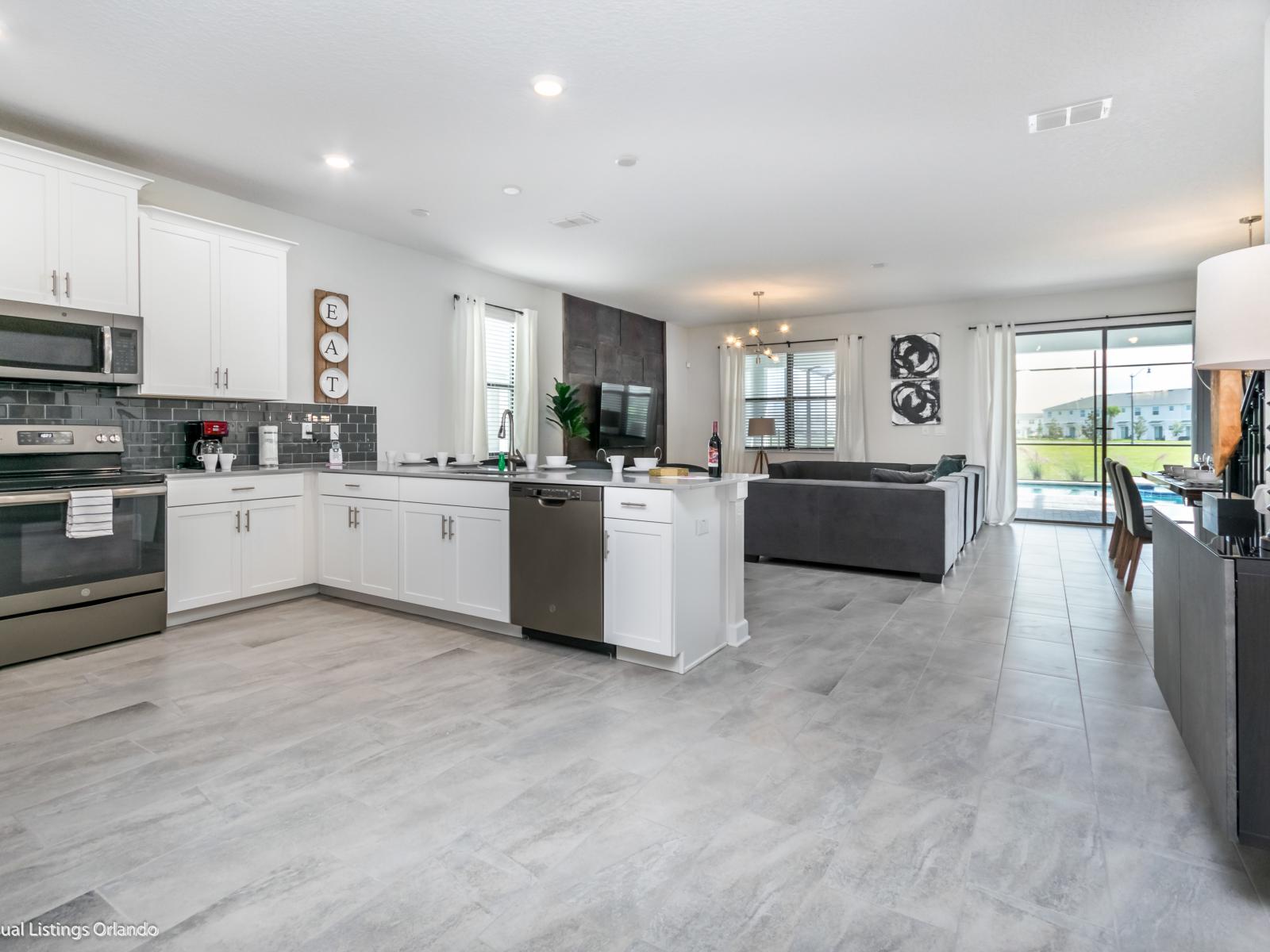 Modern Kitchen Enhanced by Stylish Gray Accents and Thoughtful Decors, Elevating Culinary Spaces with Contemporary Charm.