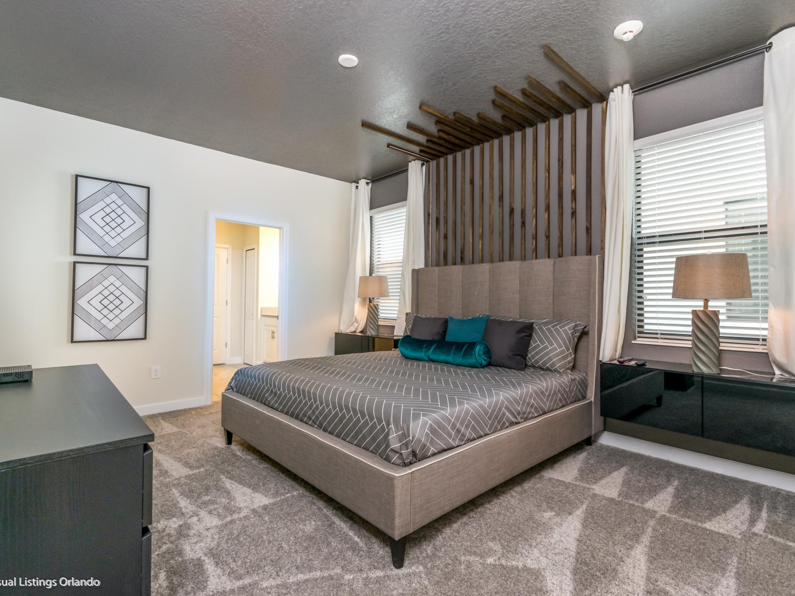 Charming bedroom of the home in Kissimmee Florida - Thoughtfully designed bedroom featuring functional and stylish furniture - Comfy double bed for relaxation - Modern and stylish decor that complements the space