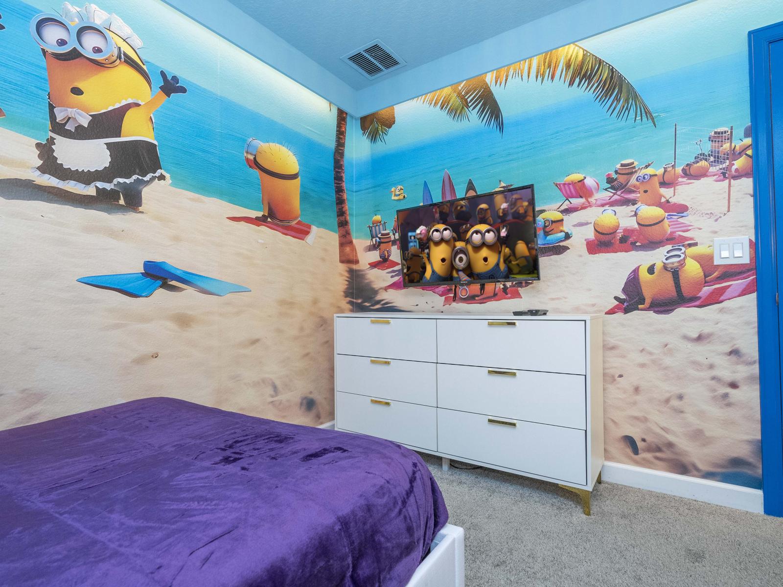 Minions themed bedroom of the home in Kissimmee Florida - Featuring one double bed and one single bed - Inviting bedroom with a soothing color palette for a tranquil feel.