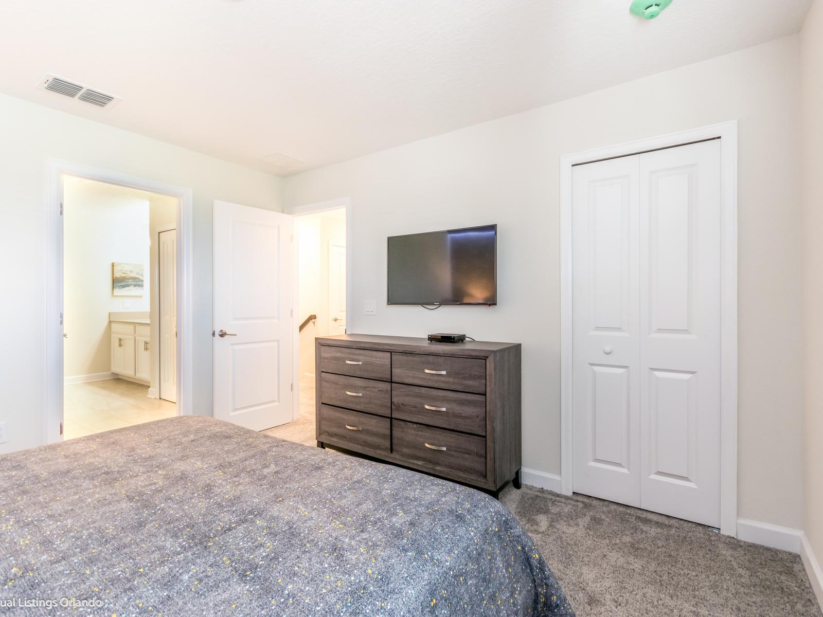 A Bedroom that Exudes Timeless Elegance with Thoughtfully Chosen Gray Accents, Offering a Perfect Balance of Modern Design and Tranquil Retreat.