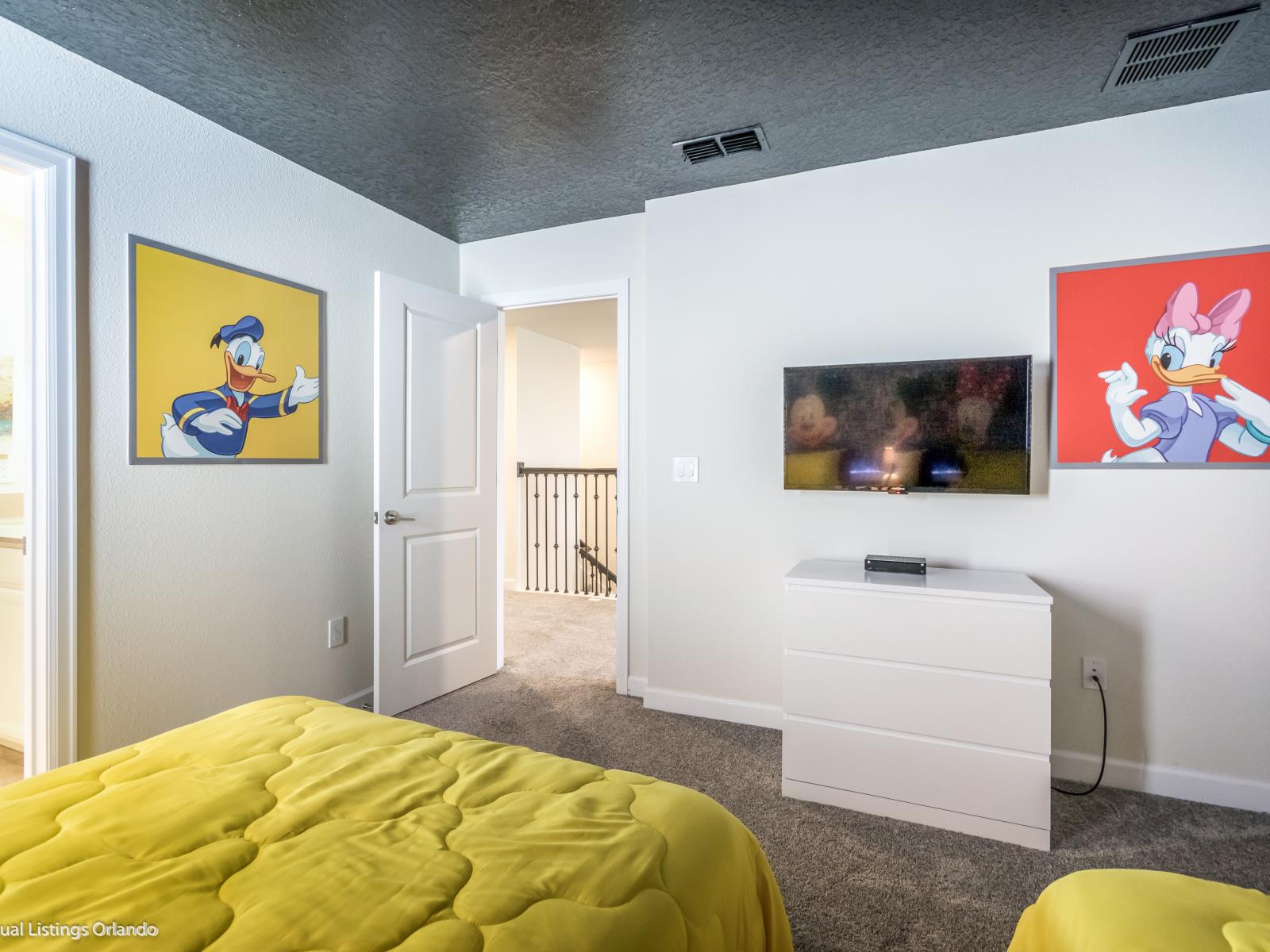 Mickey and Friends Magic: Step into the World of Disney with our Playful Mickey and Friends Themed Bedroom.