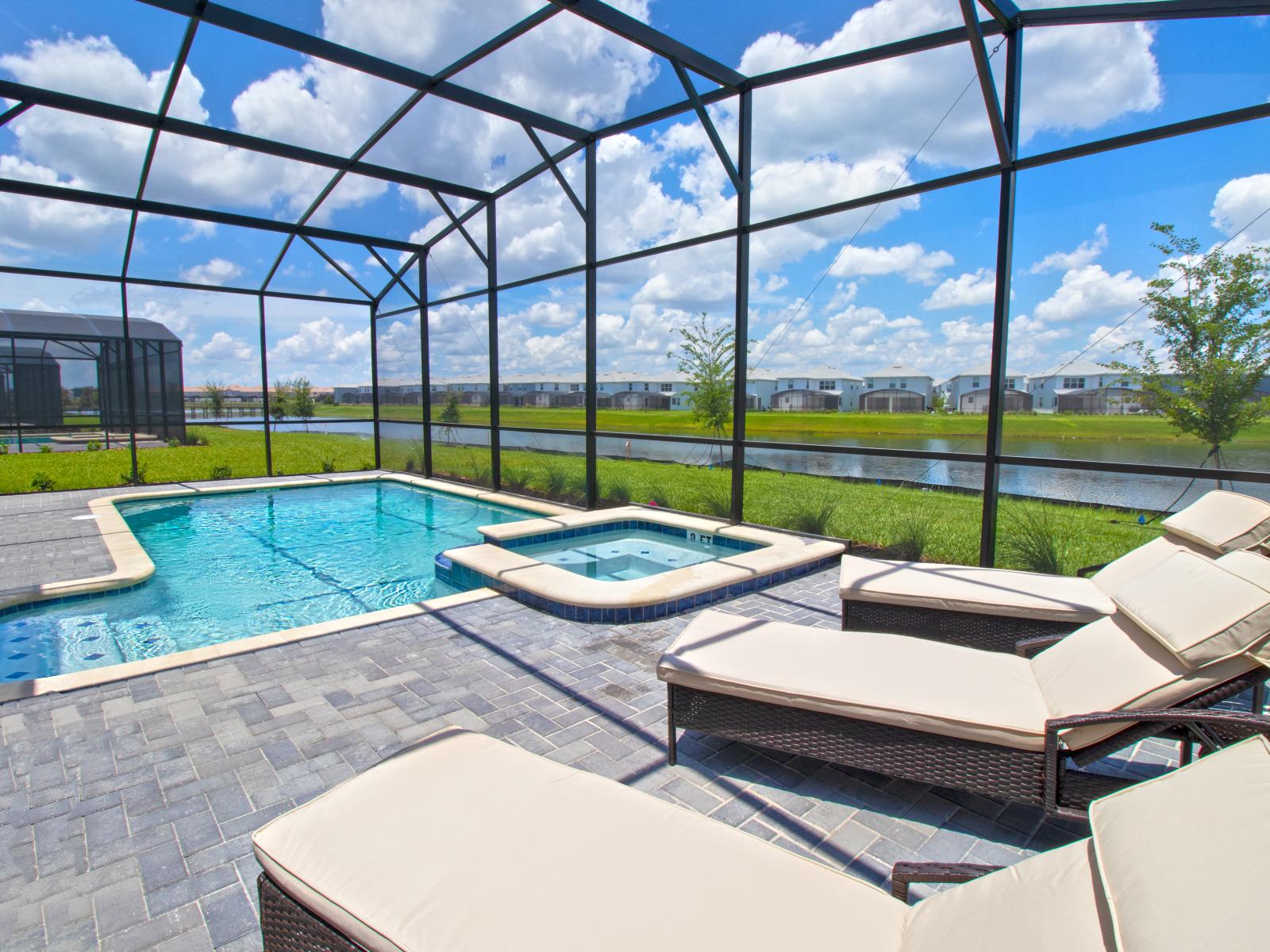 Amazing pool area of the home in Kissimmee Florida - Immerse yourself in the cool elegance of pool - Comfortable lounge chairs for ultimate relaxation - Serena atmosphere by the lake