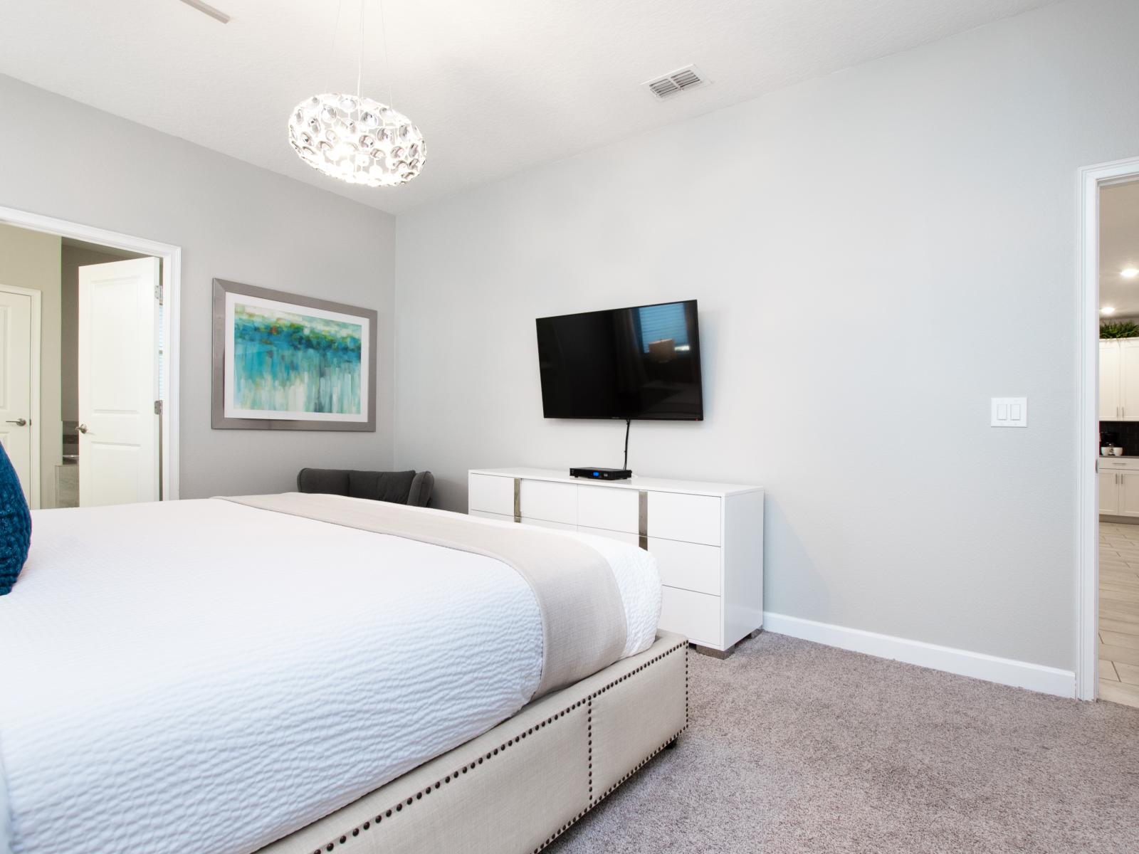 Luxury meets comfort in our spacious bedroom with a king-size bed, ensuite bath, and a Smart TV featuring Netflix.