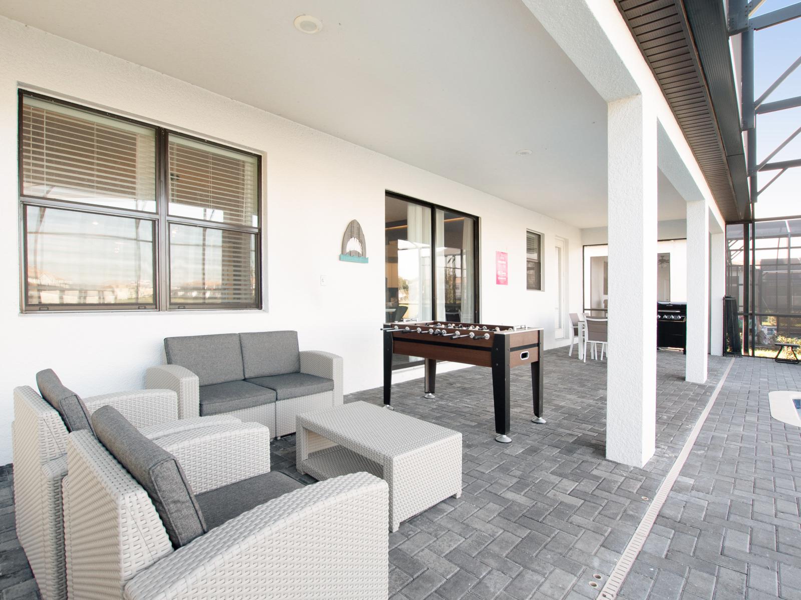 Embrace the outdoors in our inviting living area, perfect for relaxing under the open sky.