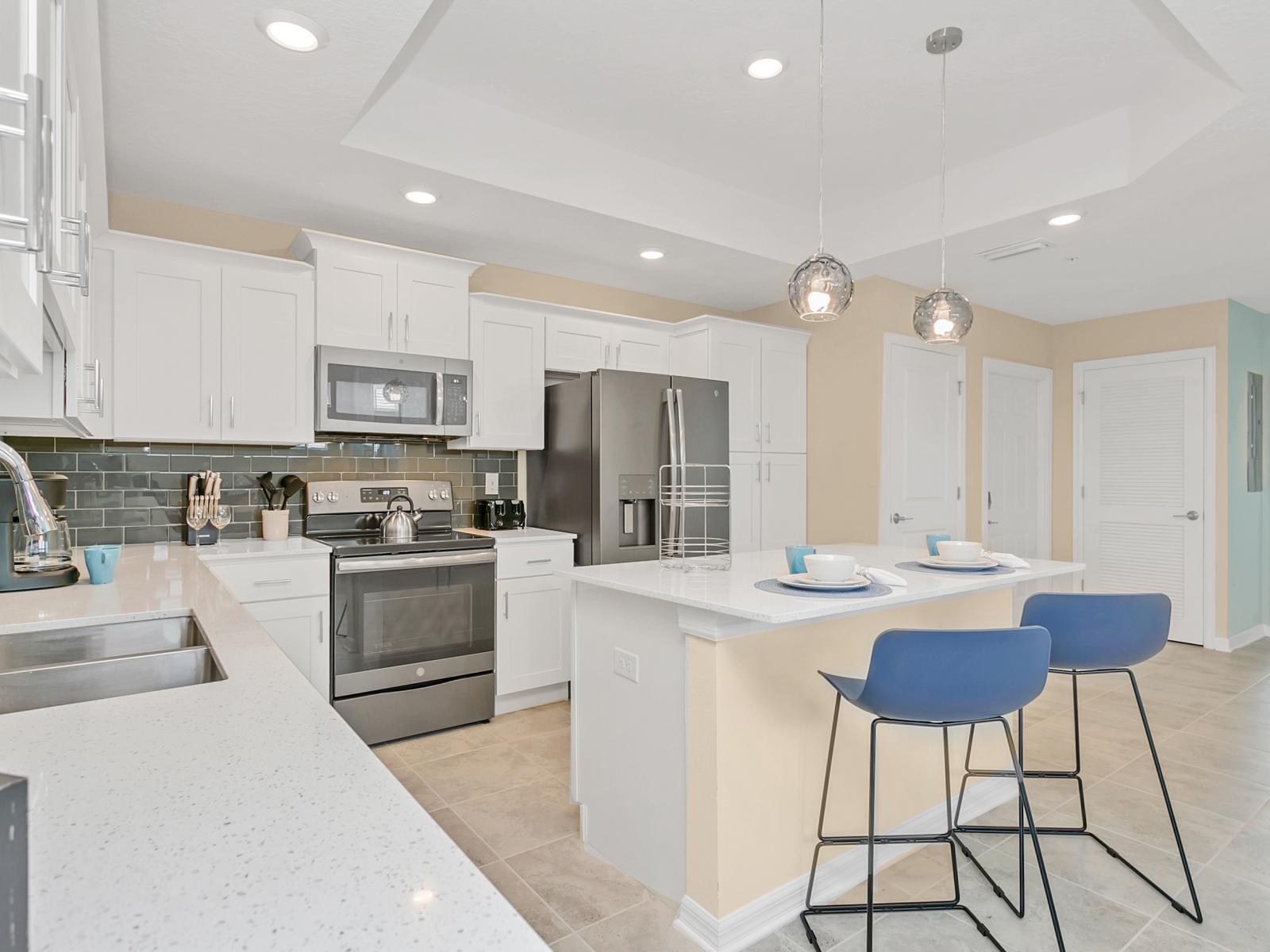 - Sublime and fully equipped kitchen of the condo in Kissimmee - Sufficient space to work according to your ease - Plenty of storage space - Stainless steel appliances with other accessories available - High chairs available at the breakfast counter