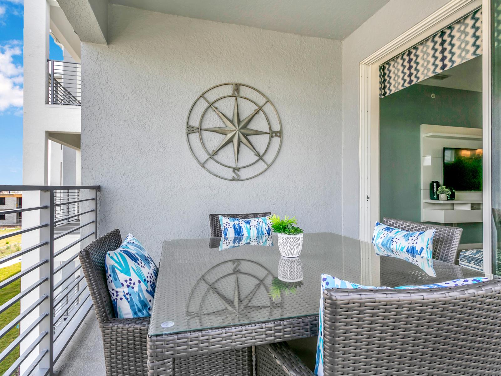 - Marvelous private balcony of the condo in Kissimmee - Featuring a magnificent 4 persons outdoor dinning table to enjoy your meals in a refreshing and vibrant atmosphere