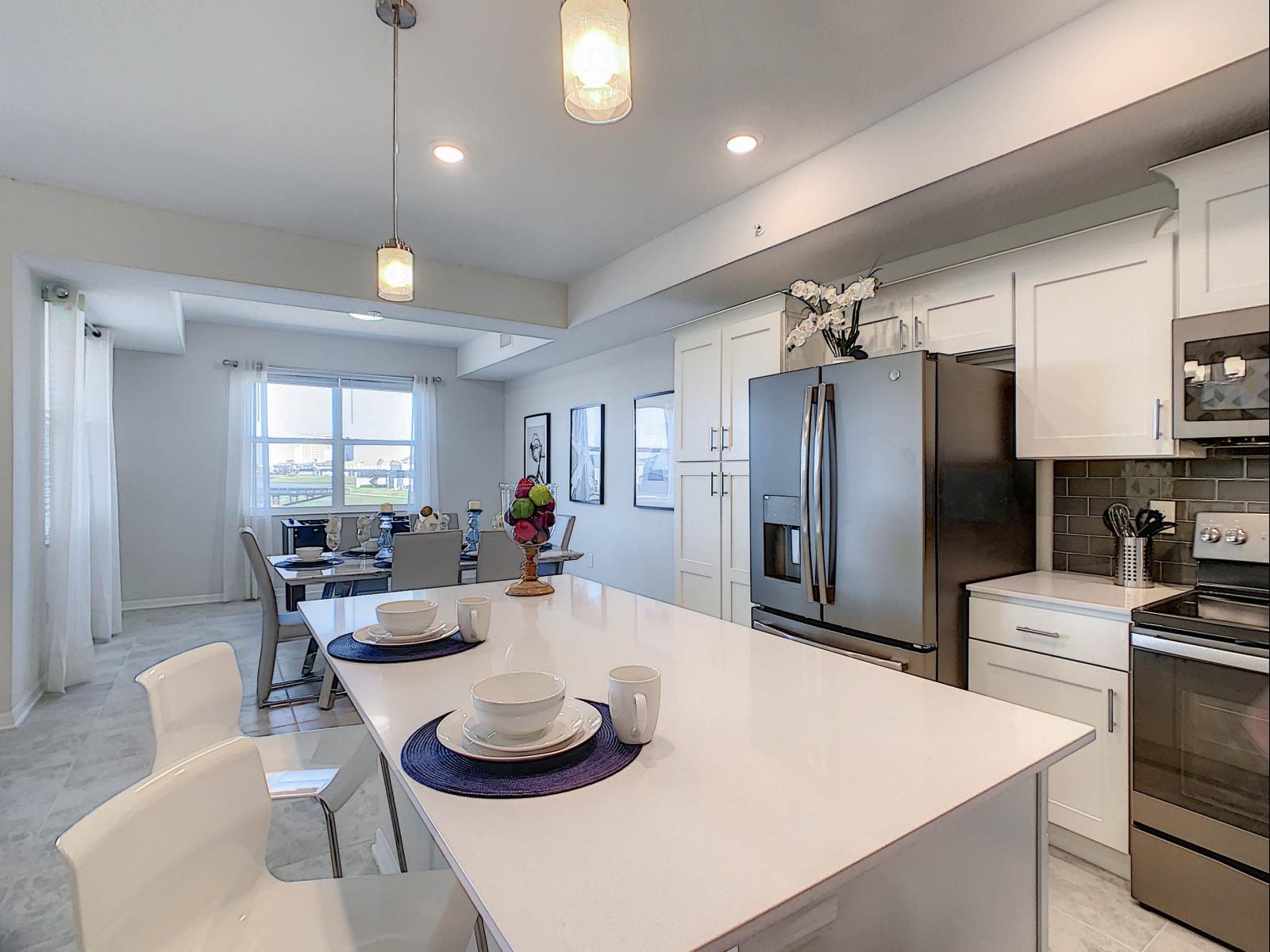 Cooking in Style: Our condo's kitchen is a chef's dream, fully furnished with contemporary flair, creating a space where cooking becomes a stylish affair