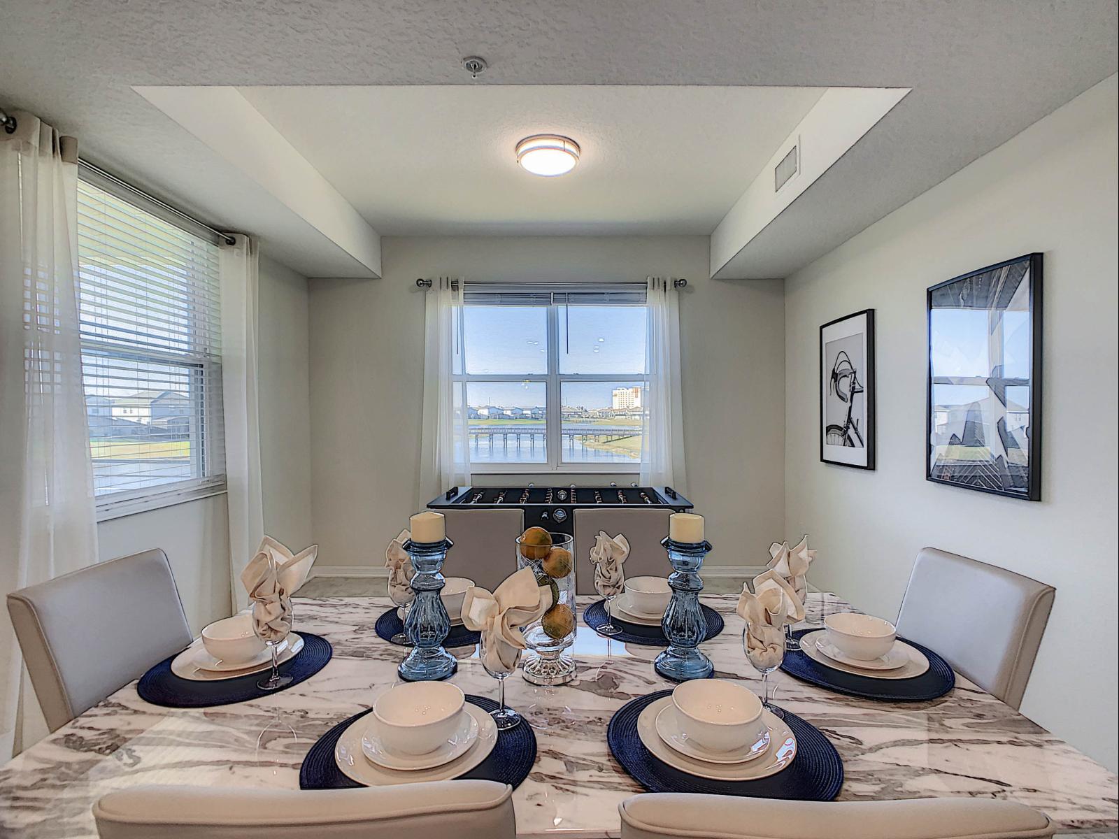 Dining Opulence: Savor your meals in an atmosphere of refined luxury in our condo's dining area, complete with elegant chairs that enhance the overall aesthetic