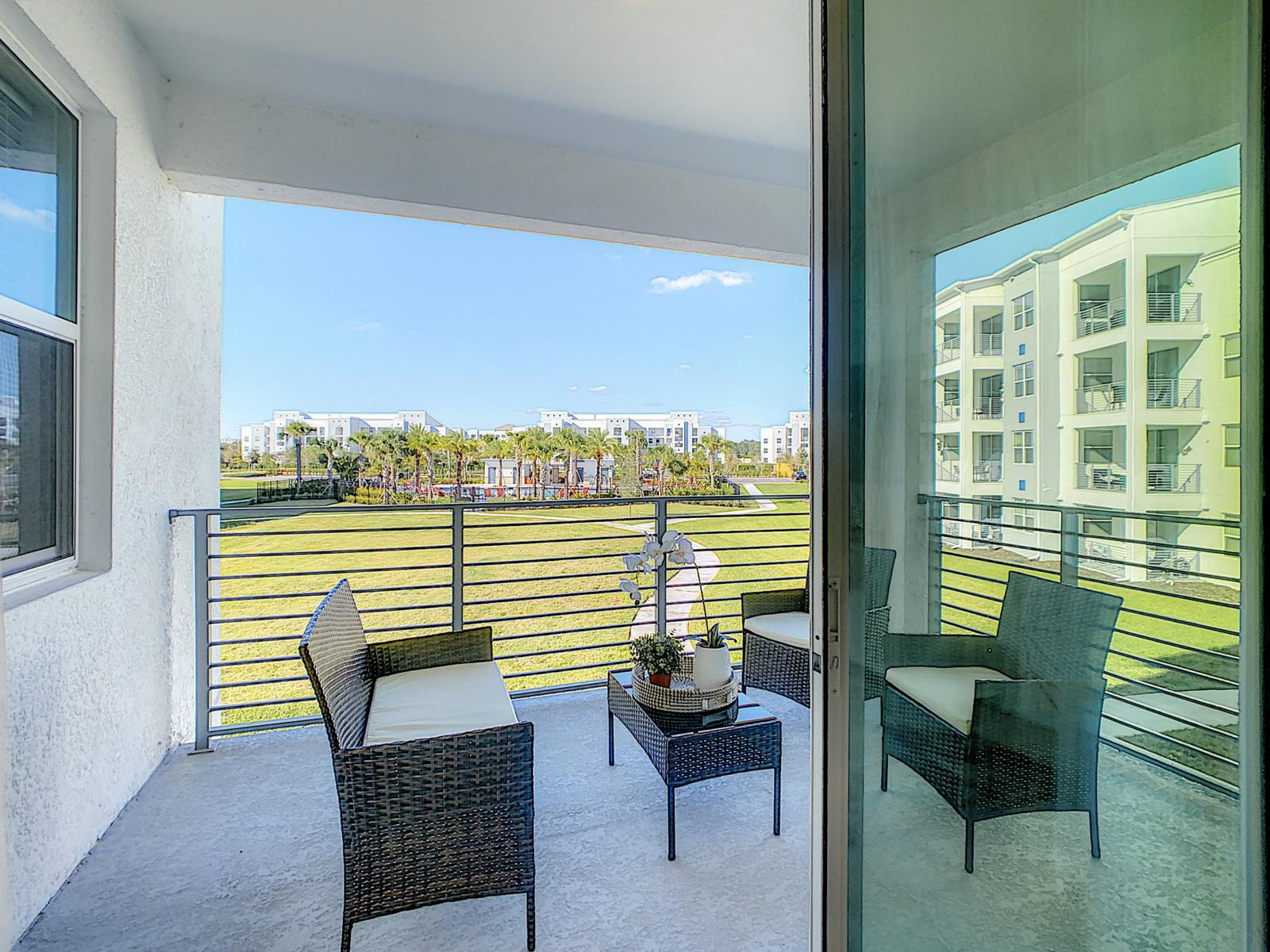 Nature's Embrace: Enjoy your morning coffee on the private balcony with a lush lawn view, a serene oasis amidst the urban bustle.