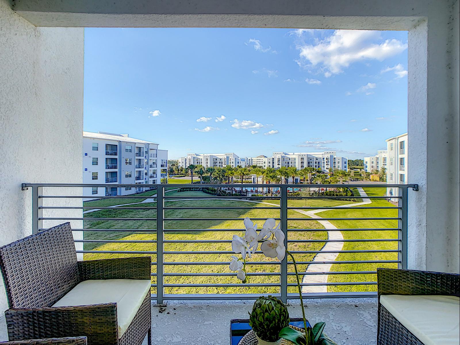 Verdant Views: Elevate your stay with a balcony that opens up to a stunning lawn panorama, creating a harmonious blend of urban living and natural beauty