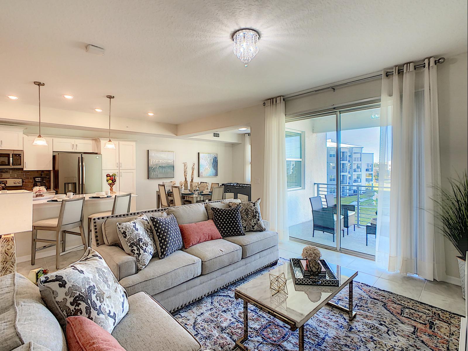 Modern Grandeur: Immerse yourself in luxury with our condo's living room – a showcase of contemporary design, top-notch amenities, and a welcoming atmosphere