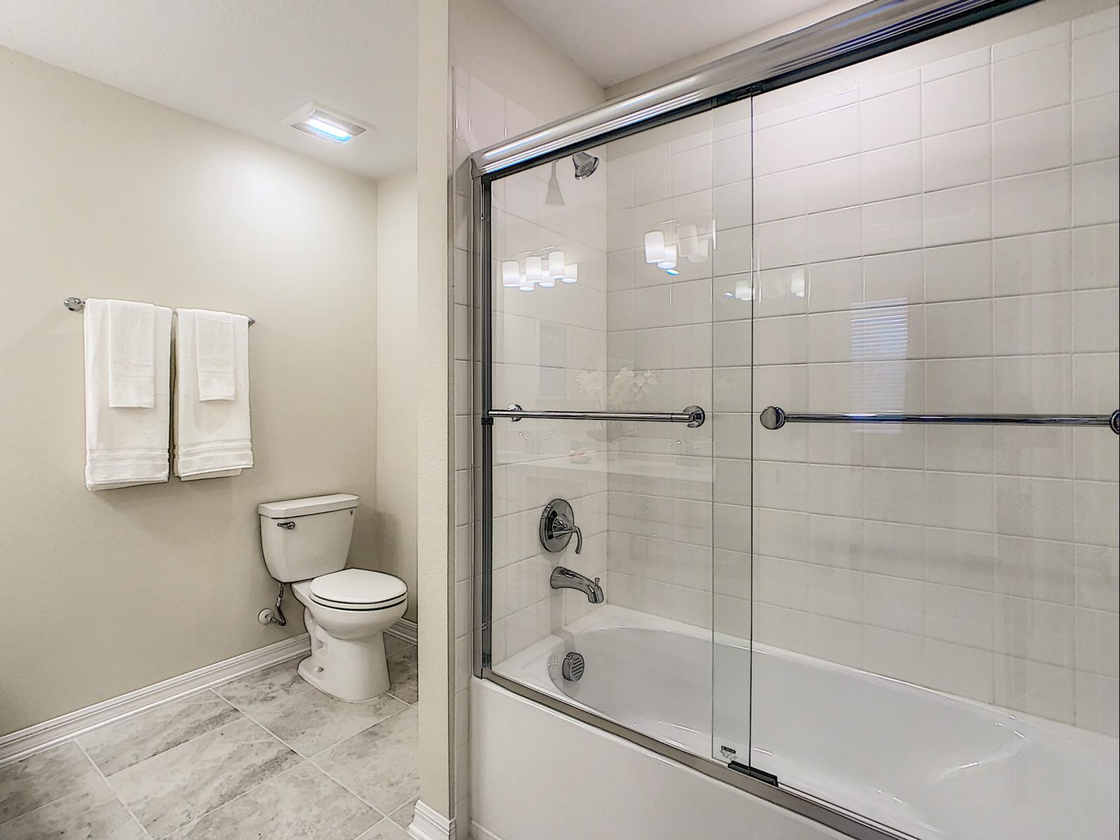 Zen Elegance: Rejuvenate your senses in our condo's master bathroom, where zen-inspired design and high-end features create a haven of tranquility