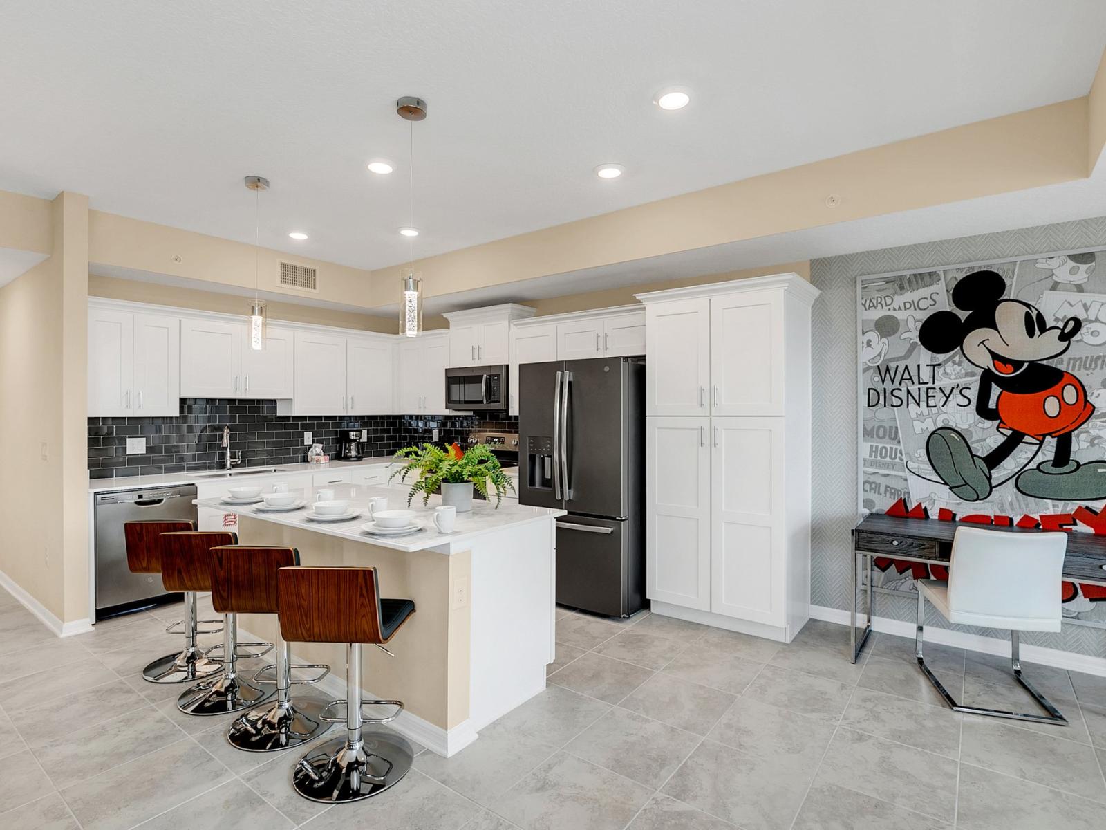 Charming Kitchen of the condo in Kissimmee Florida - Modern kitchen with sleek, stainless-steel appliances - Smart use of space with versatile storage solutions - Fully Equipped - Open concept connecting the kitchen to the dining and living area