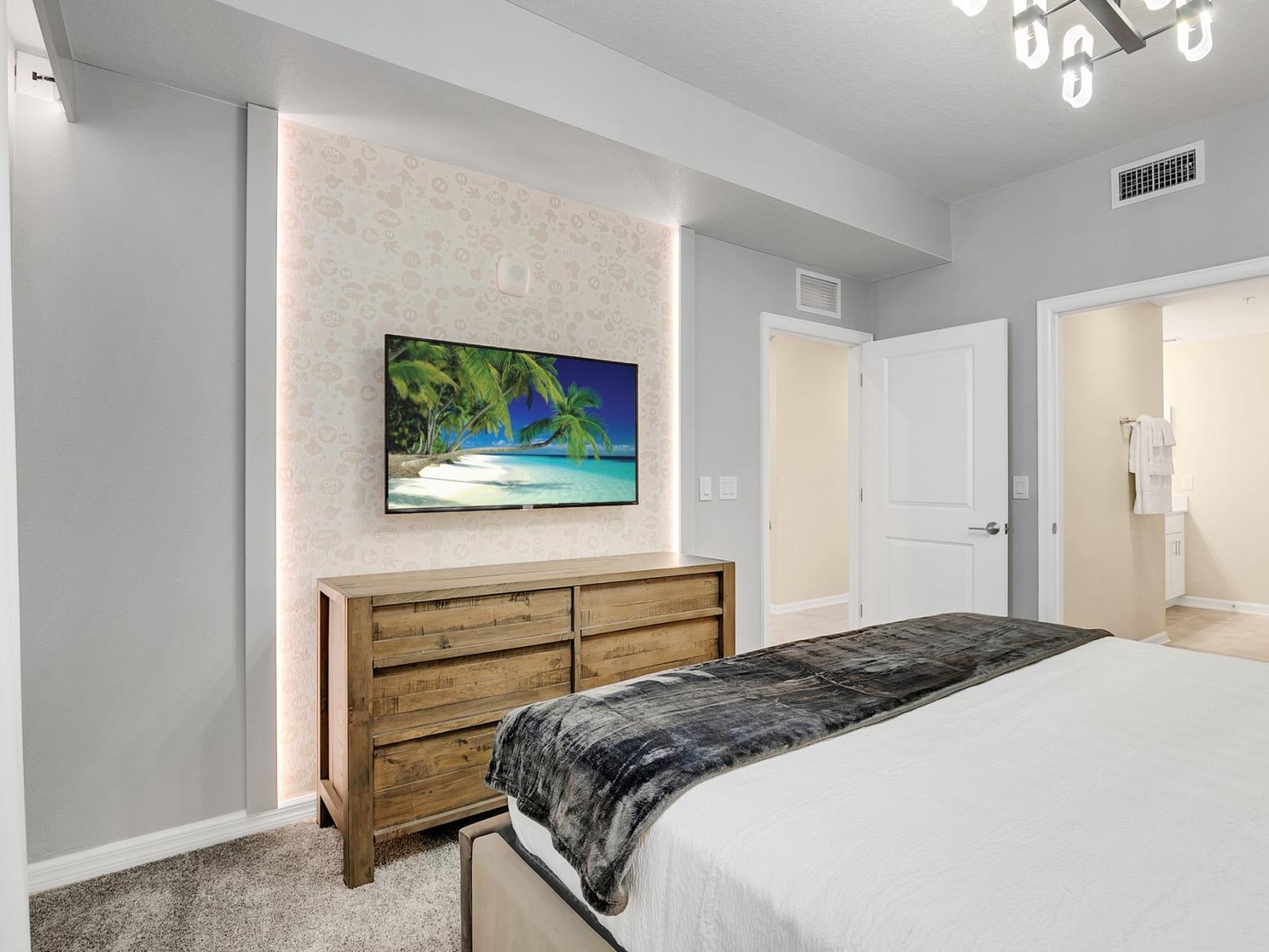 Bright bedroom of the condo in Kissimmee Florida - Thoughtfully designed bedroom featuring functional and stylish furniture - Attached bathroom for privacy and convenience - Thoughtfully designed for comfort and style