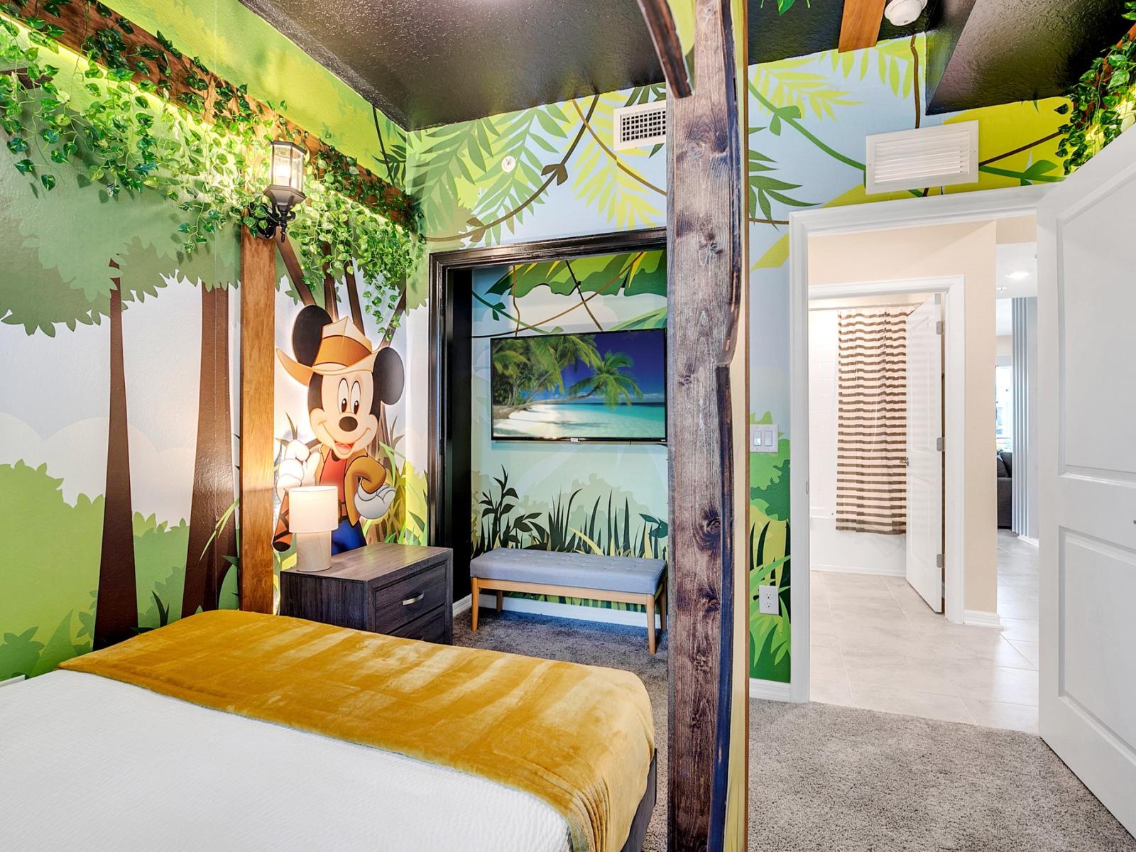 Mickey Magic: Immerse Yourself in the Whimsical World of Our Mickey Mouse Themed Bedroom.