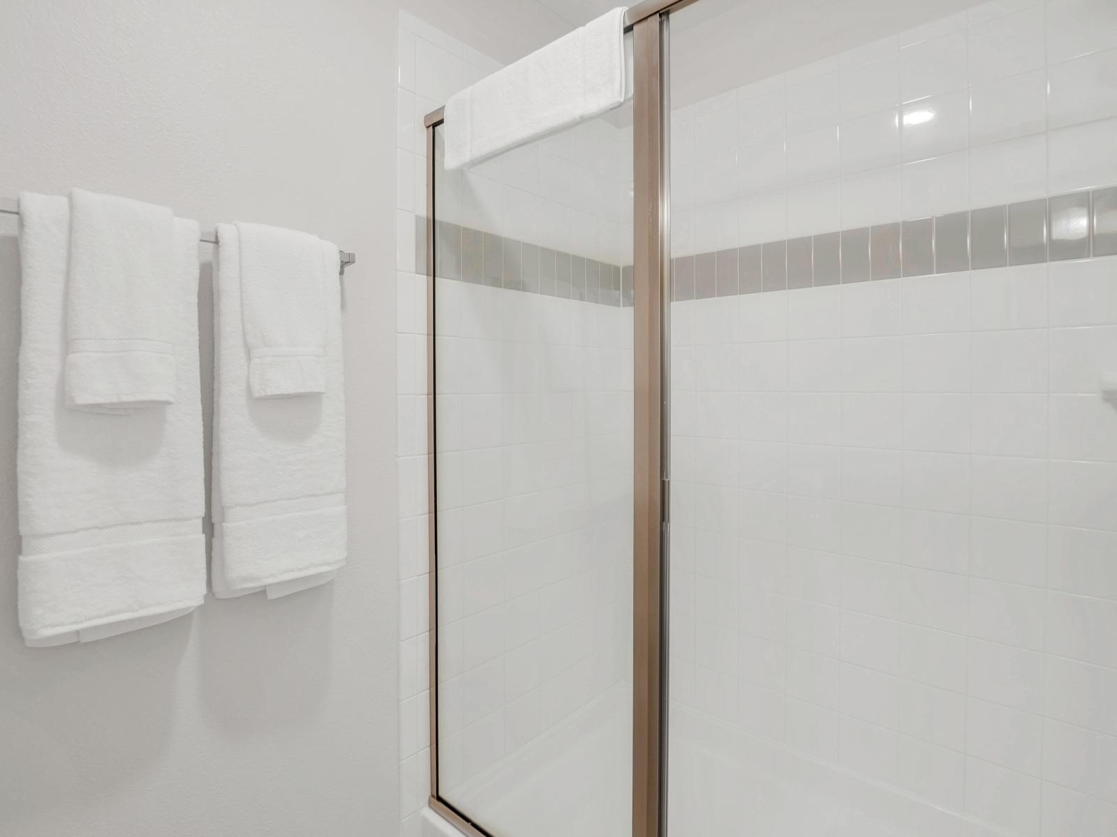 The  shower room – a sleek and inviting space designed for relaxation and rejuvenation.