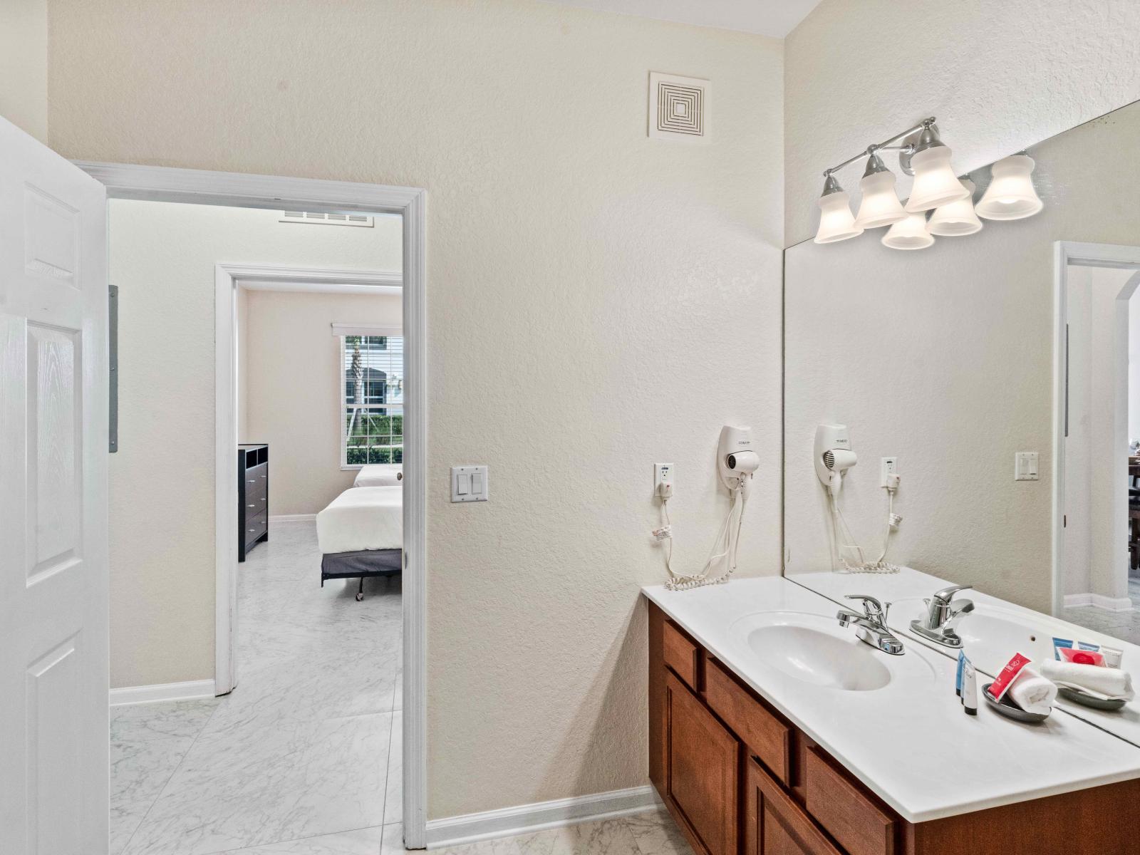 Bathroom 2 with a bathtub and a shower combo