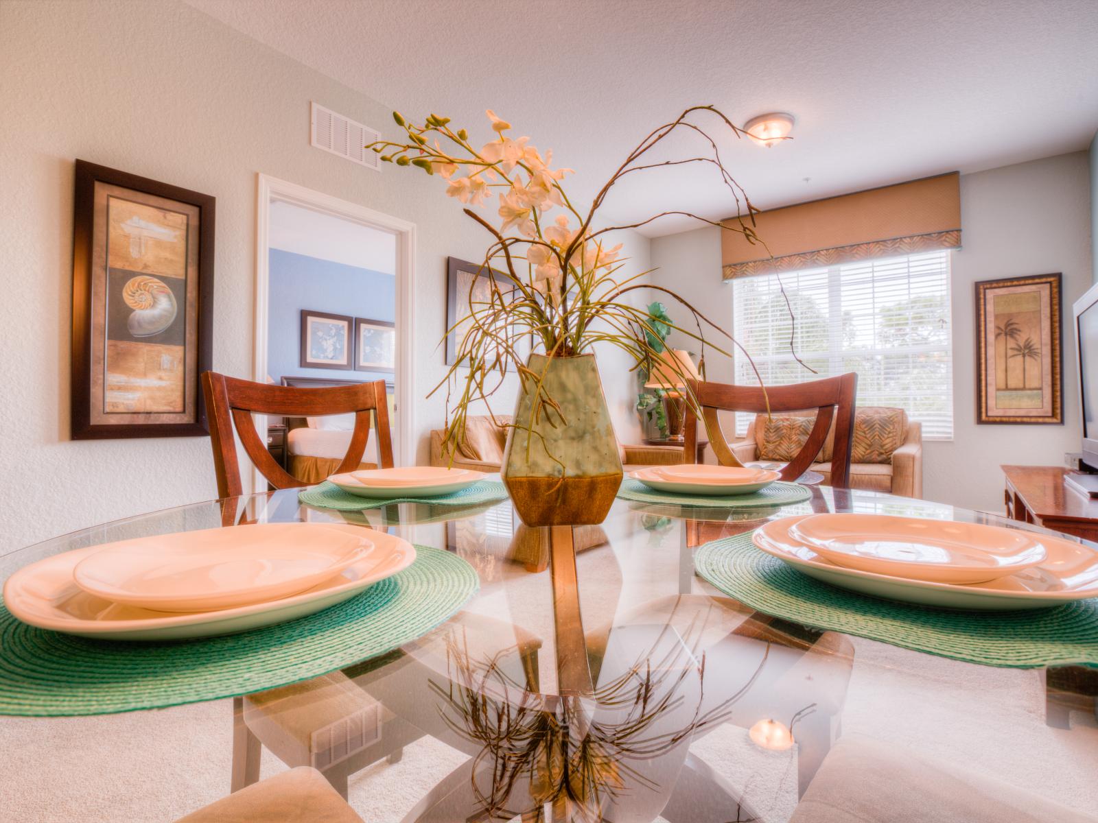 The Dining area-  provides a sophisticated setting to enjoy meals. With its tasteful decor and comfortable seating, it's the perfect spot to gather and savor delicious food in style.