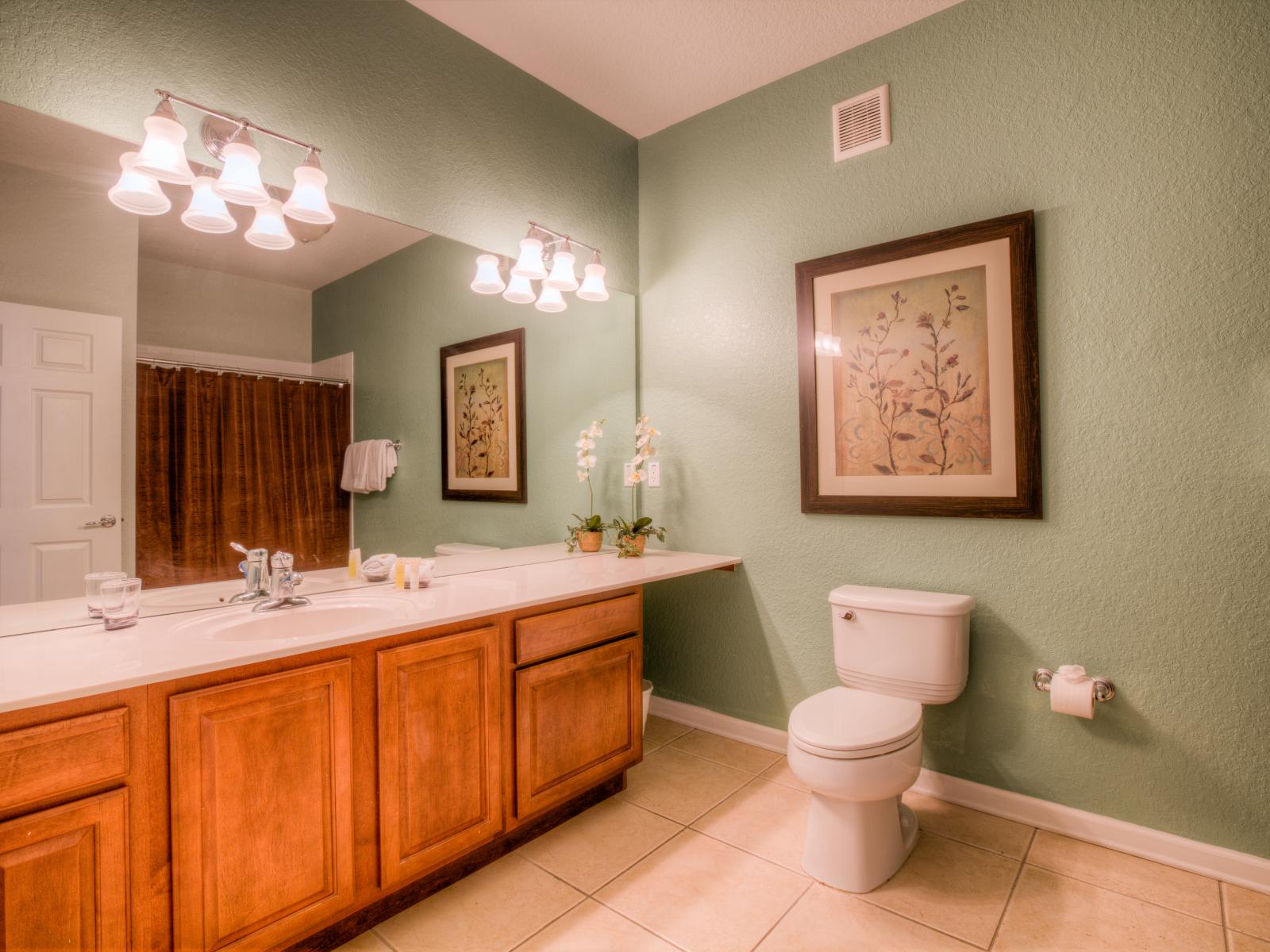 The vanity and toilet area at Vista Cay Resort offers a private oasis to indulge in self-care and relaxation.