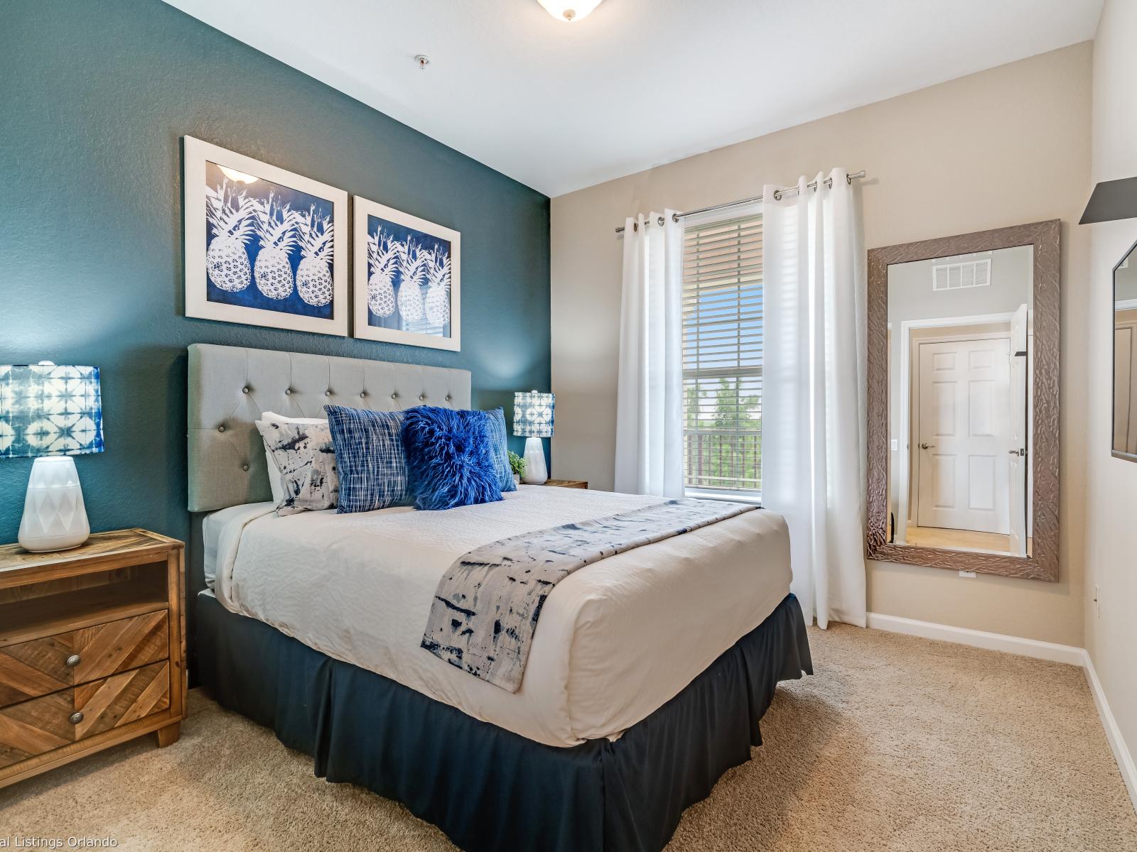 Elevate your stay with this charming second bedroom in the condo, offering a cozy and inviting atmosphere. Perfect for unwinding after a day of exploration, this delightful space promises comfort and relaxation.